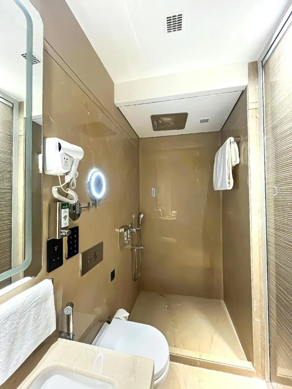 Shower in Morvee Hotels Alipore Kolkata