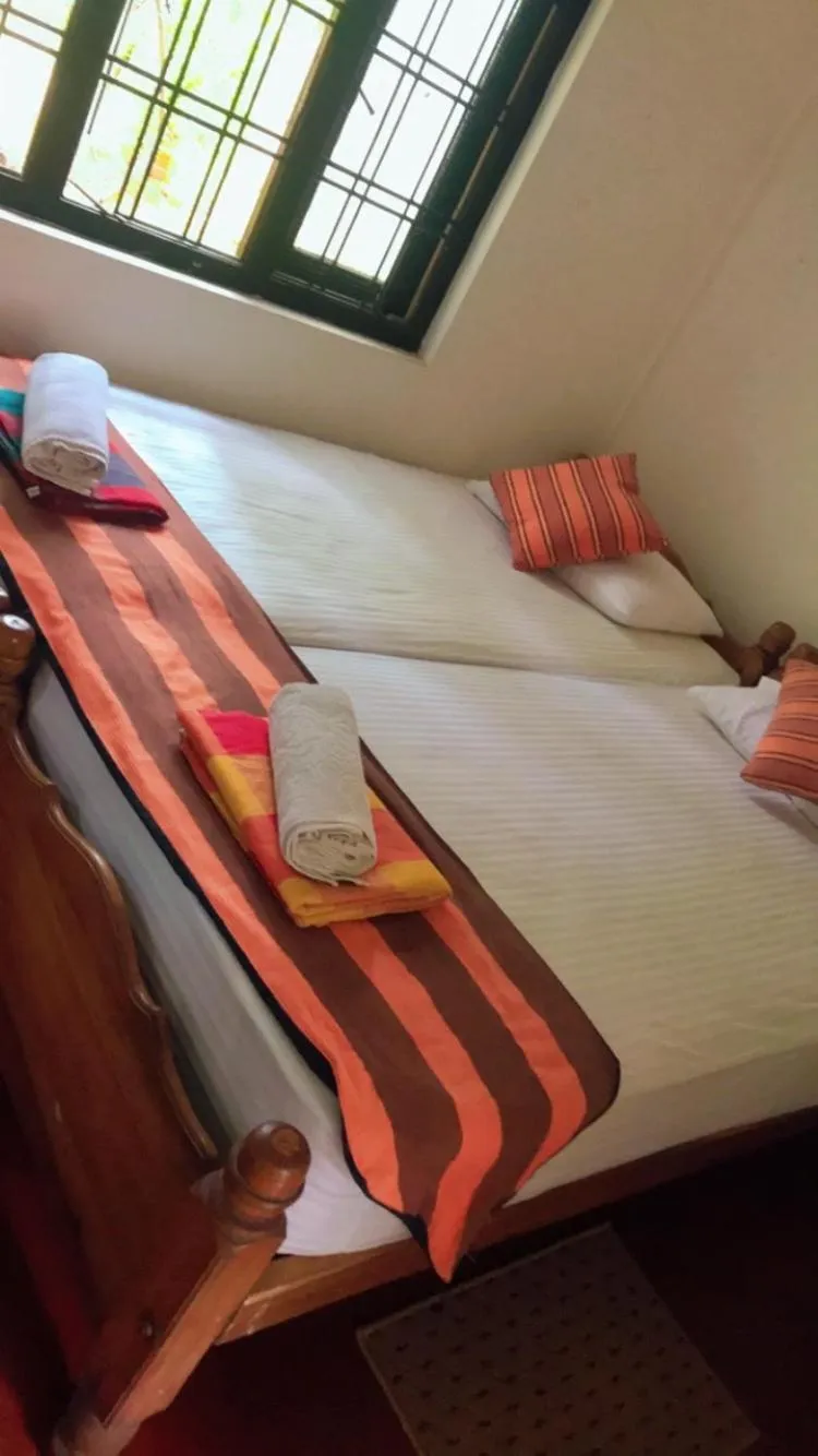 Bed in Sujatha Tourist Rest