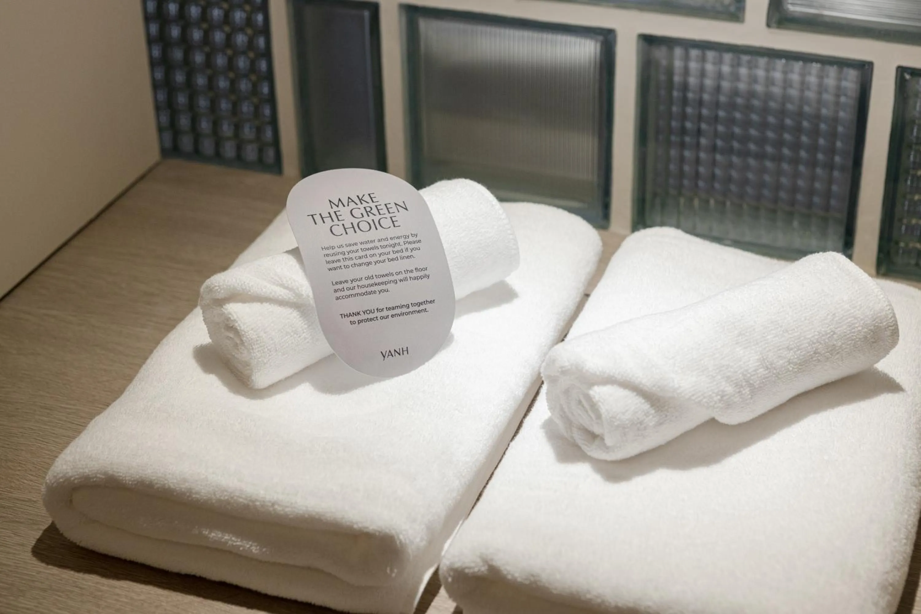 towels, Bed in YANH Ratchawat Hotel