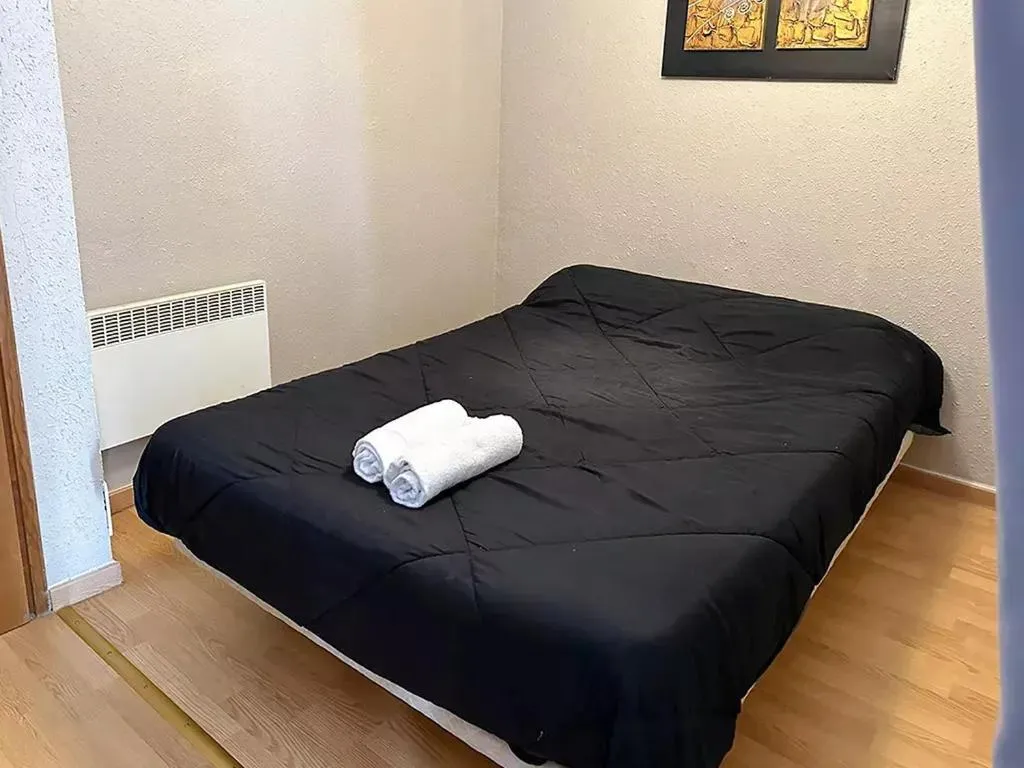 Bed in Apartamentos Solaris 3000