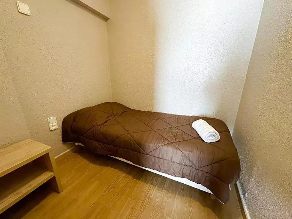 Bed in Apartamentos Solaris 3000