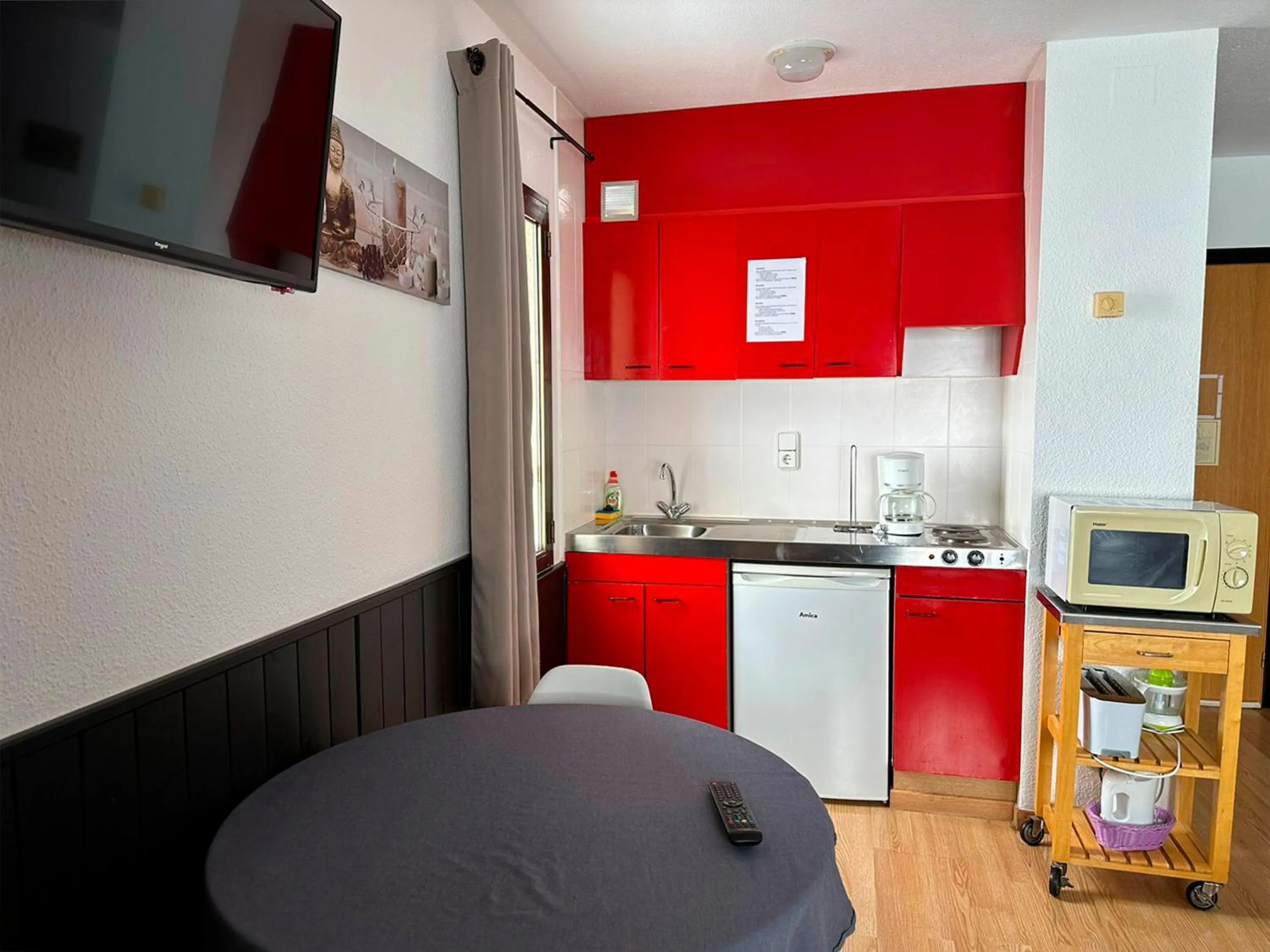 Kitchen or kitchenette in Apartamentos Solaris 3000