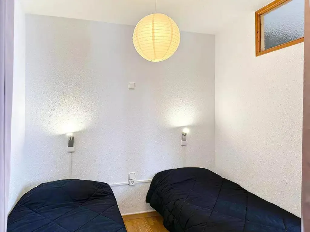 Bed in Apartamentos Solaris 3000