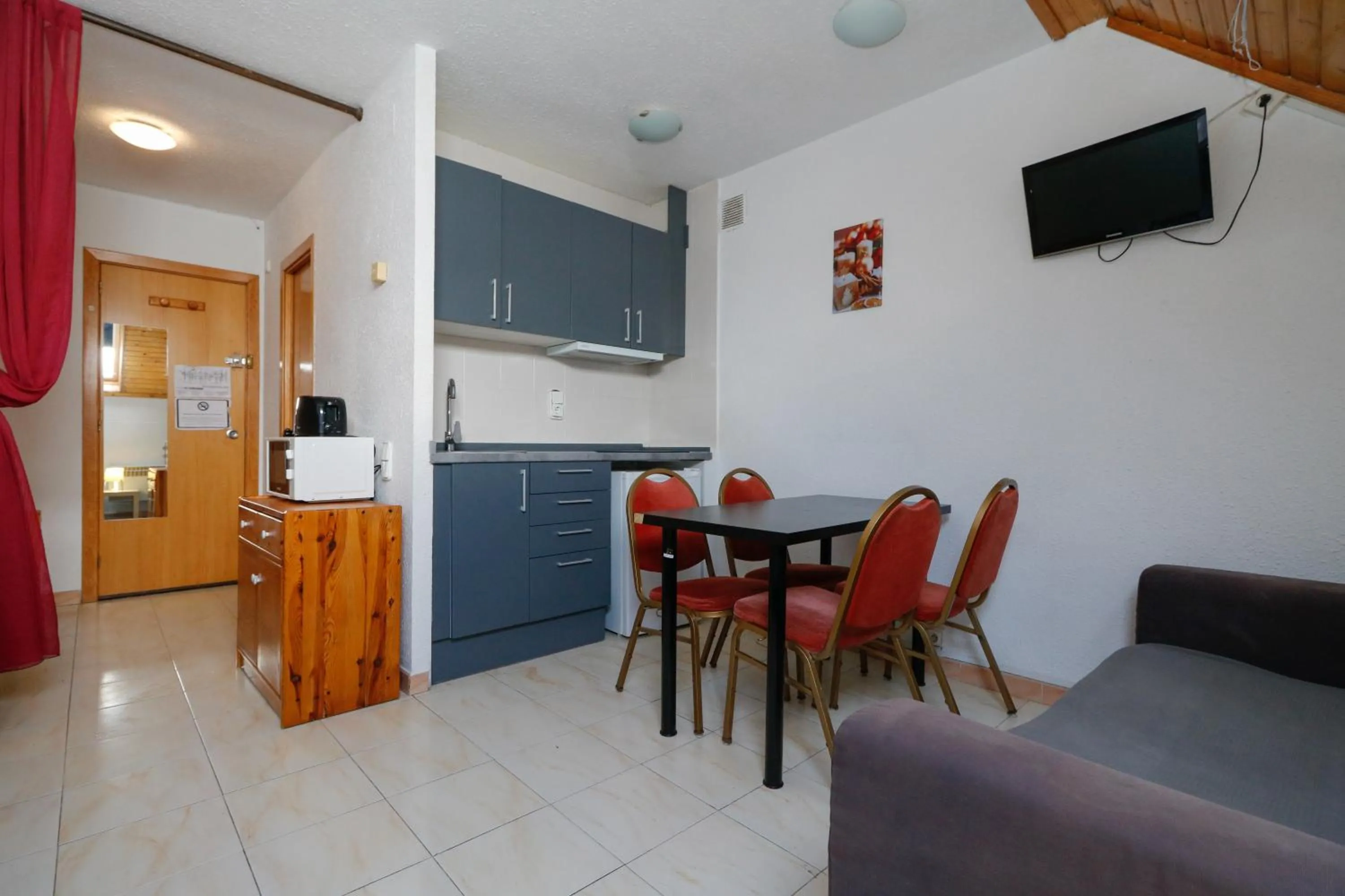 Kitchen or kitchenette in Apartamentos Solaris 3000