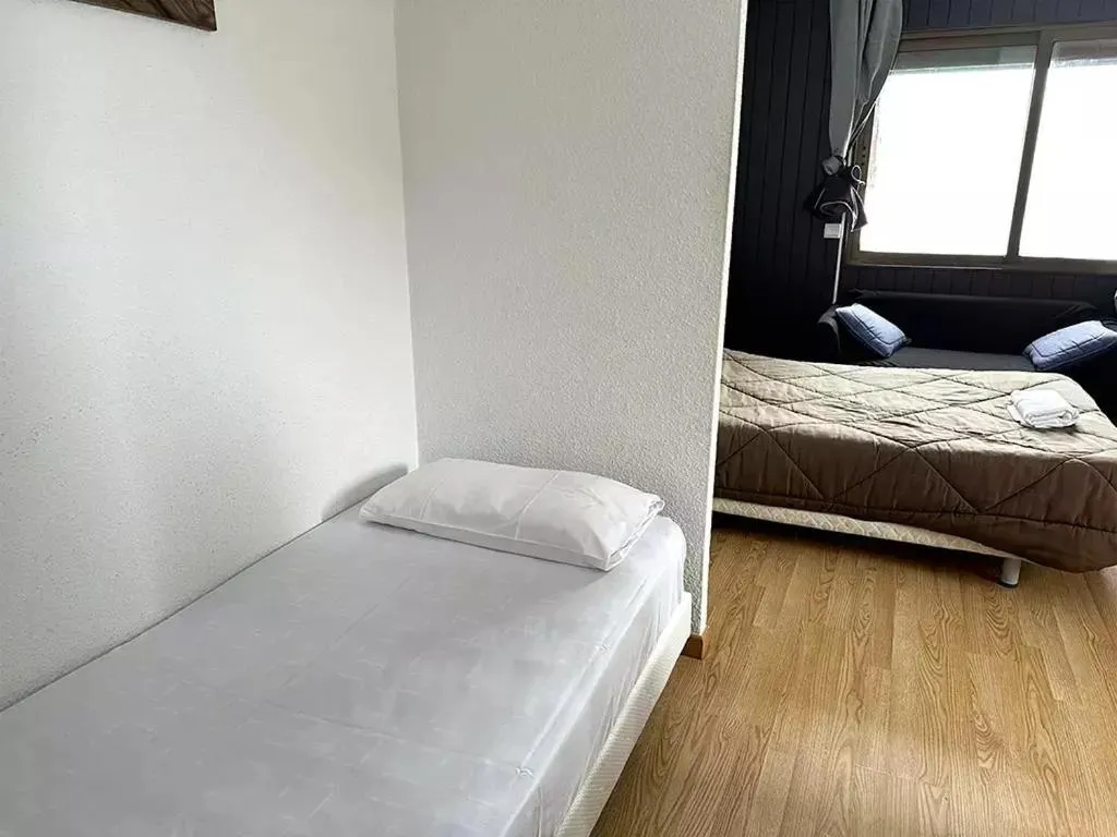 Bed in Apartamentos Solaris 3000