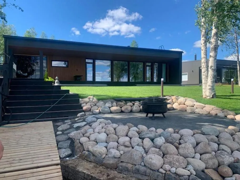 Villa by the river with beach sauna and jacuzzi