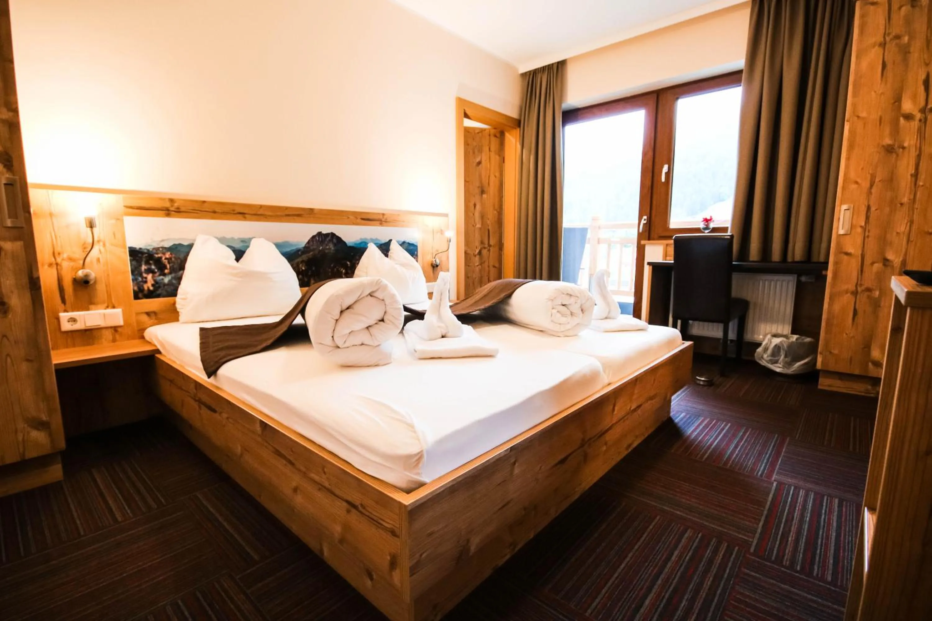 Bed in Hotel der Wolkensteinbär