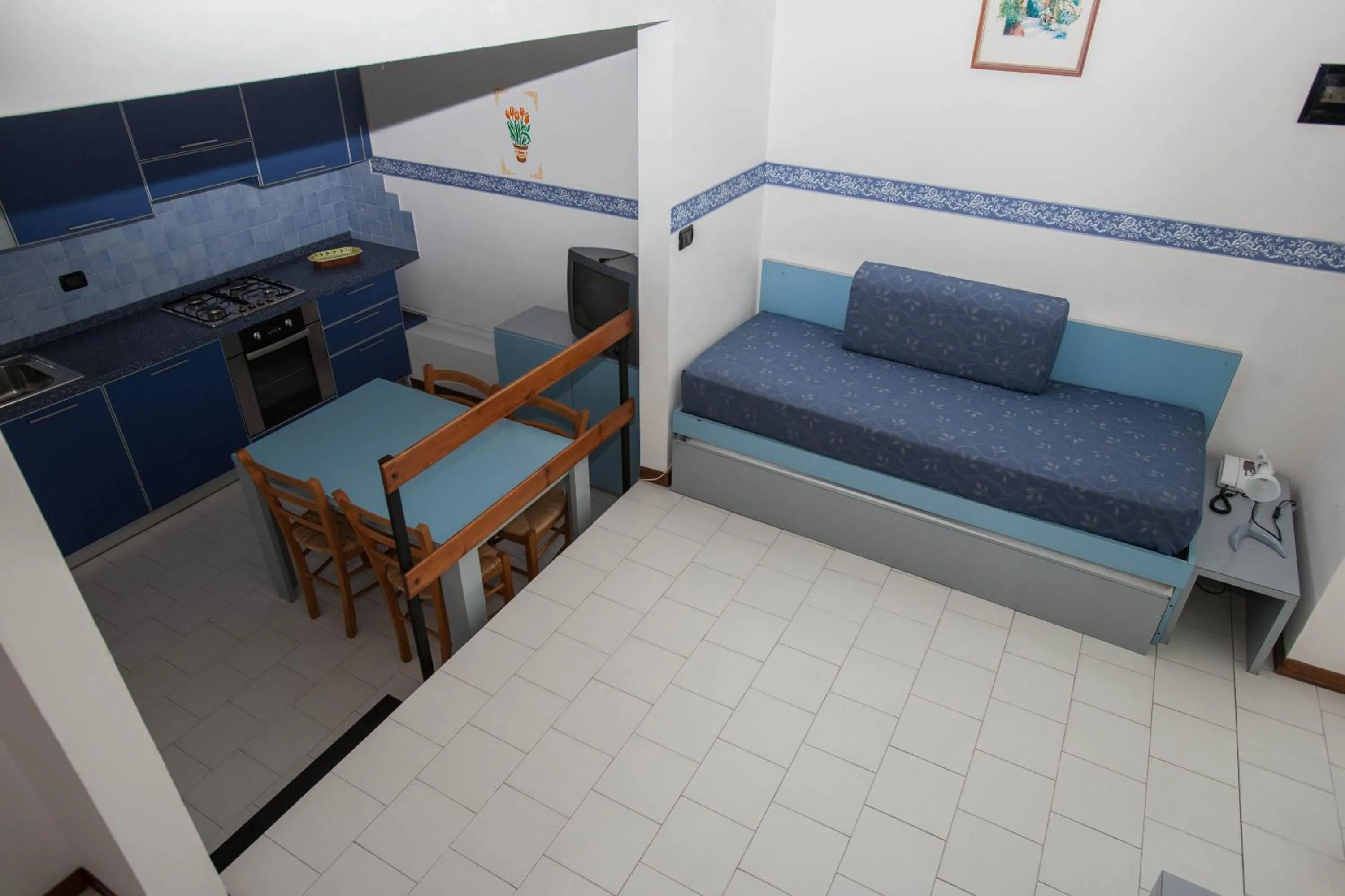 Dining area, Bed in Residence RTA Villa Marina