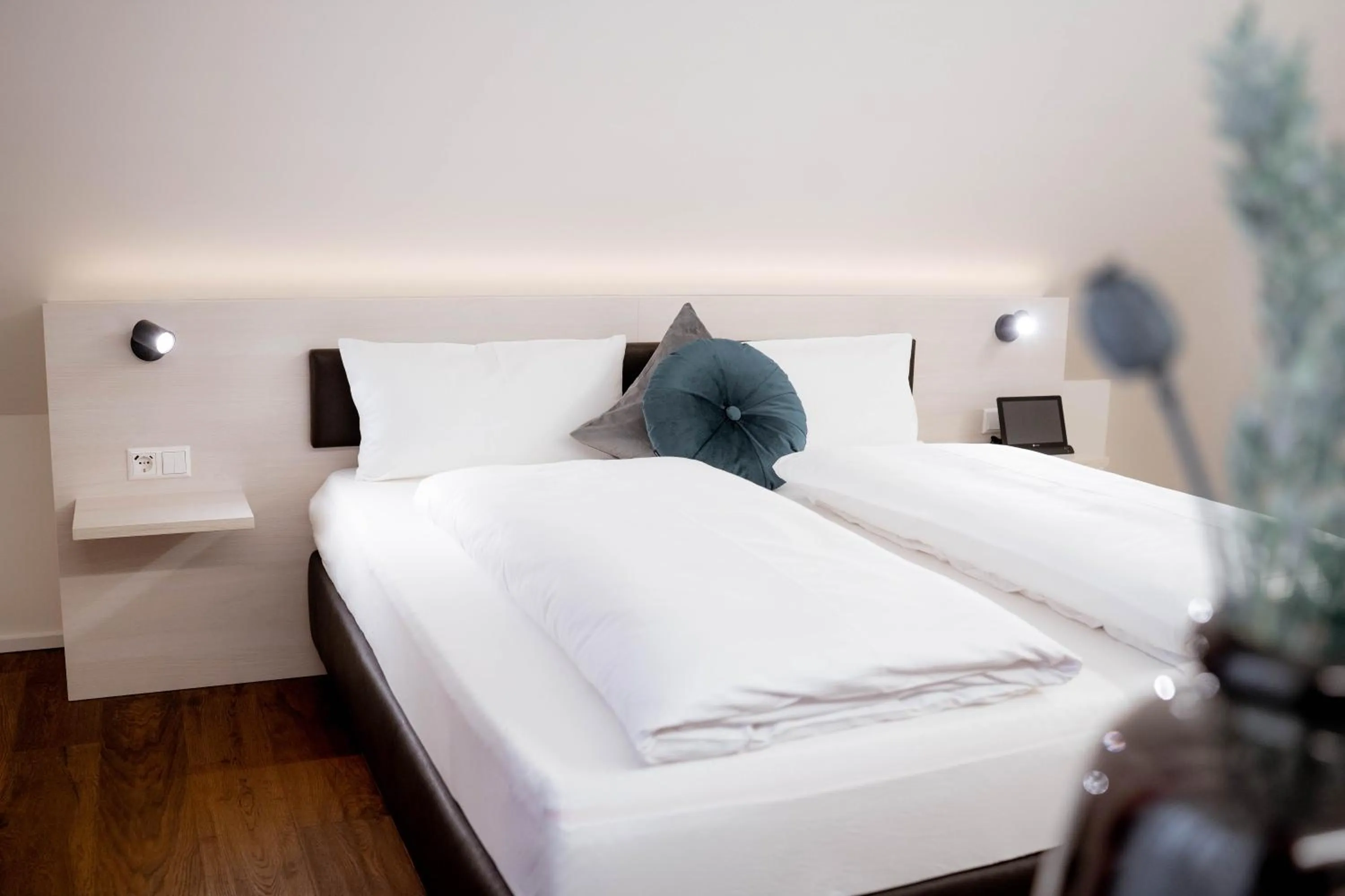 Photo of the whole room, Bed in Reos Hotel Wangen