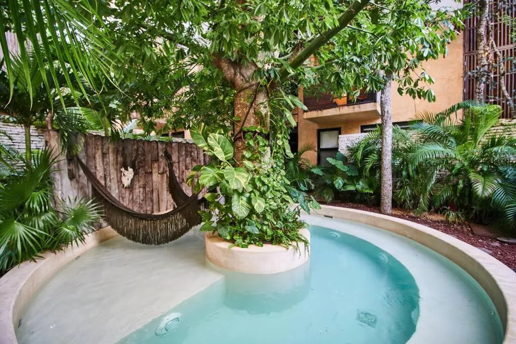 Swimming pool in Tribu 306 Boho Design Gem in the Heart of Tulum w/ rooftop
