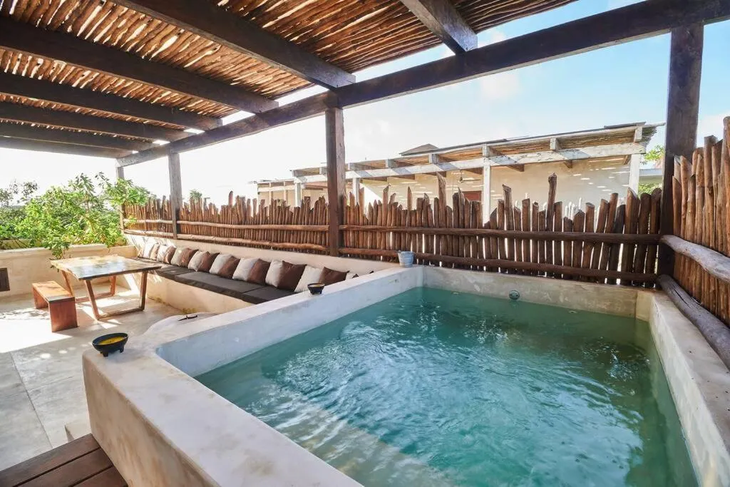 Swimming pool in Tribu 306 Boho Design Gem in the Heart of Tulum w/ rooftop
