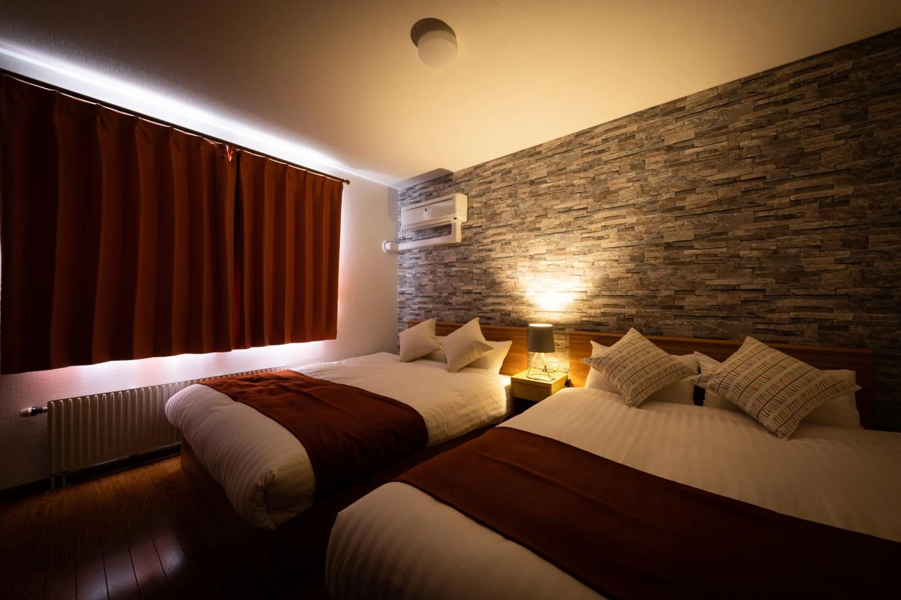 Bed in HONGO 11 HOTEL