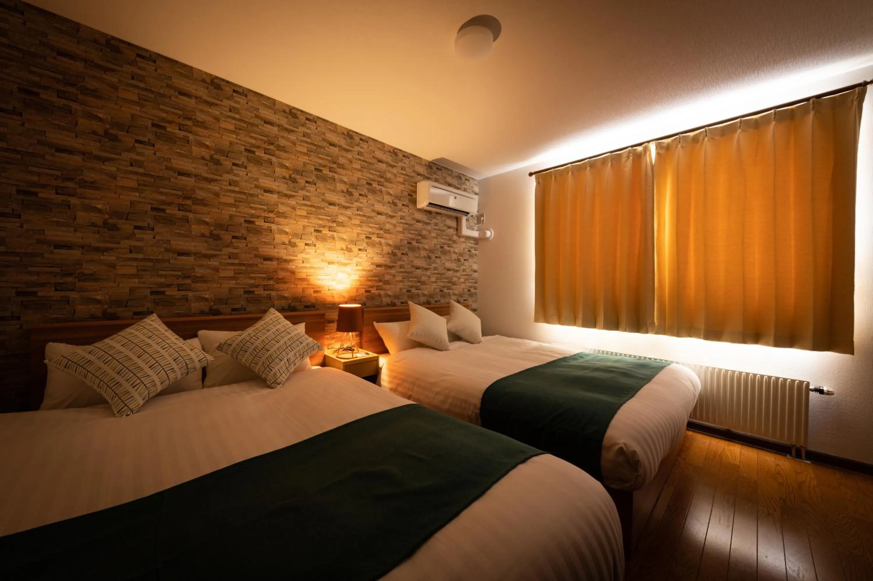 Bed in HONGO 11 HOTEL