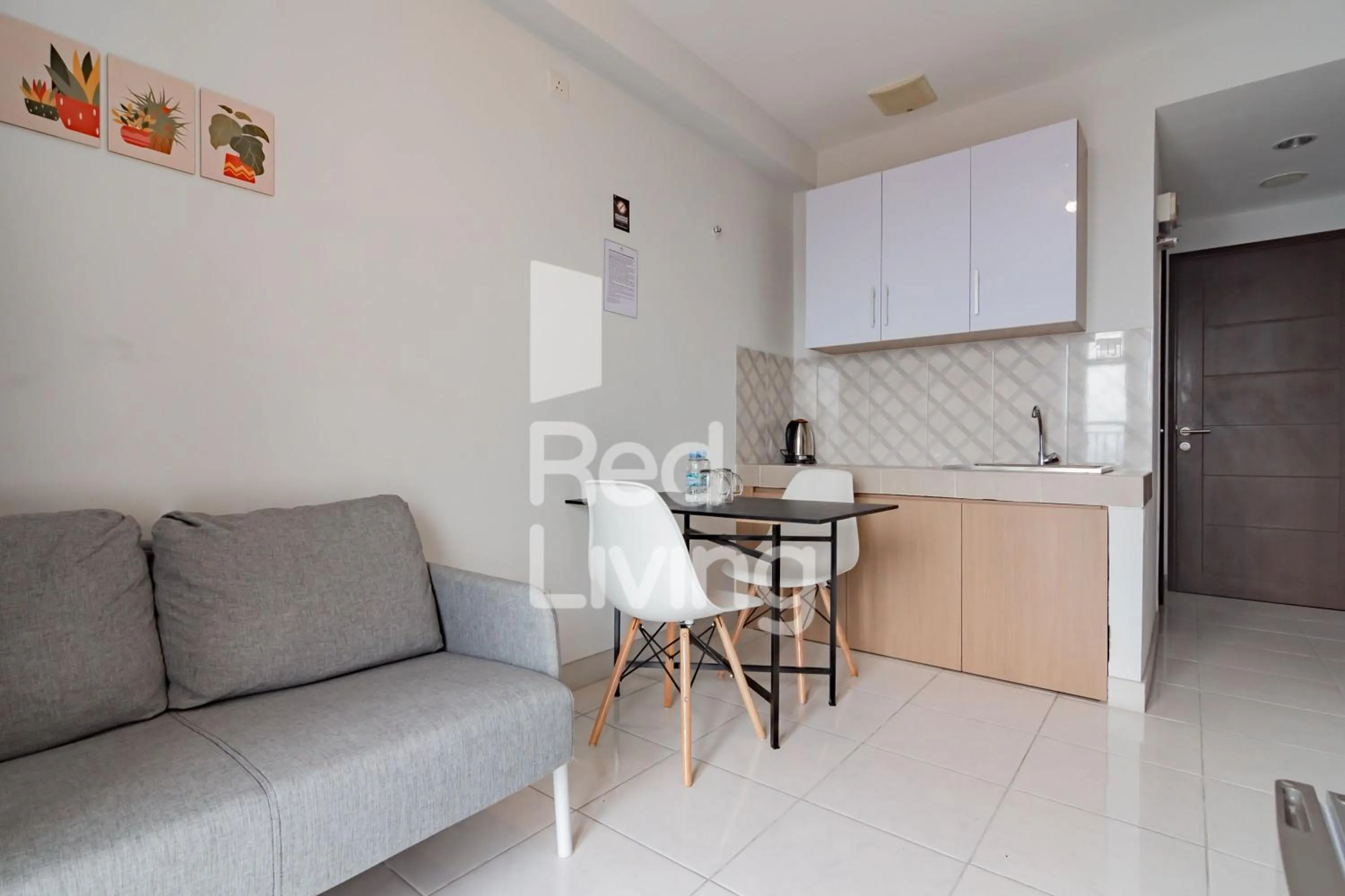 Kitchen or kitchenette in RedLiving Apartemen Mekarwangi Square - M Express