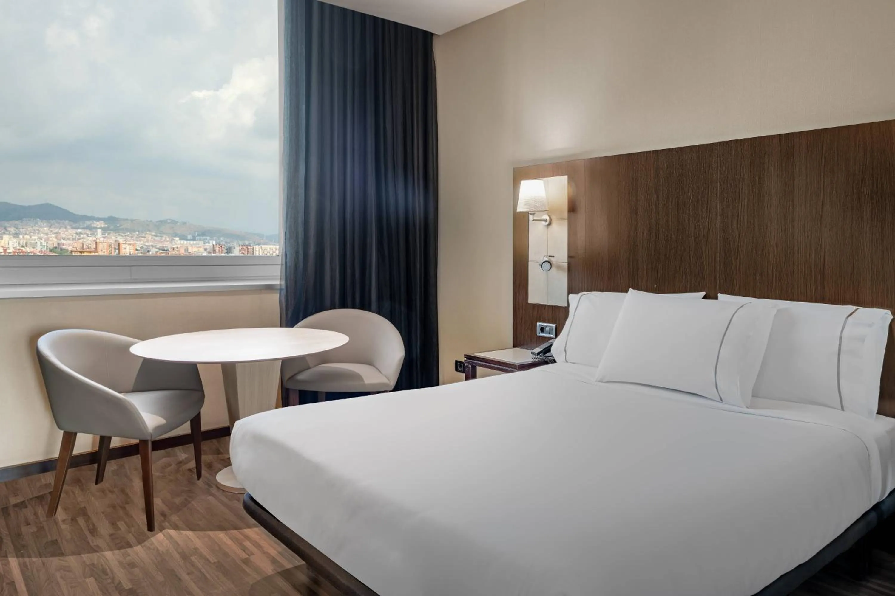 Photo of the whole room, Bed in AC Hotel Barcelona Fórum by Marriott