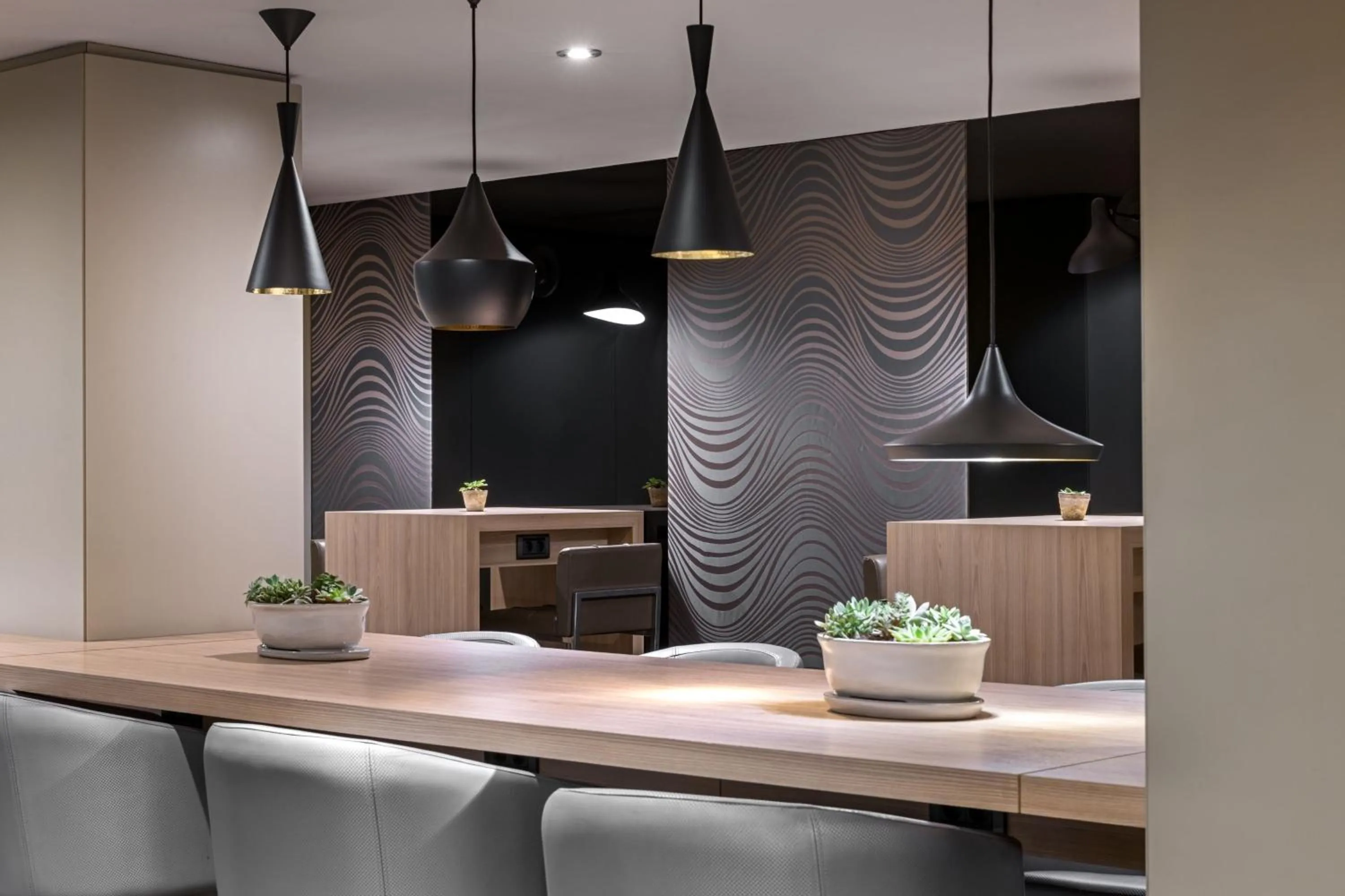 Lounge or bar in AC Hotel Córdoba by Marriott