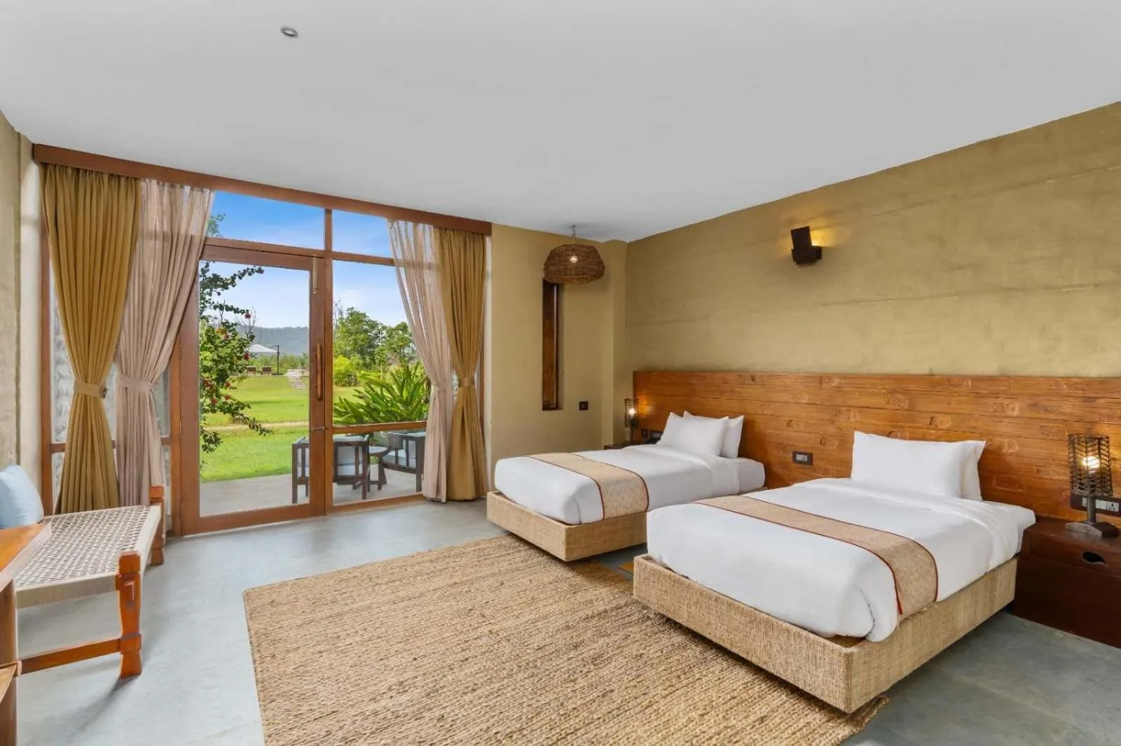 Bed in Sanctuary Chitwan National Park