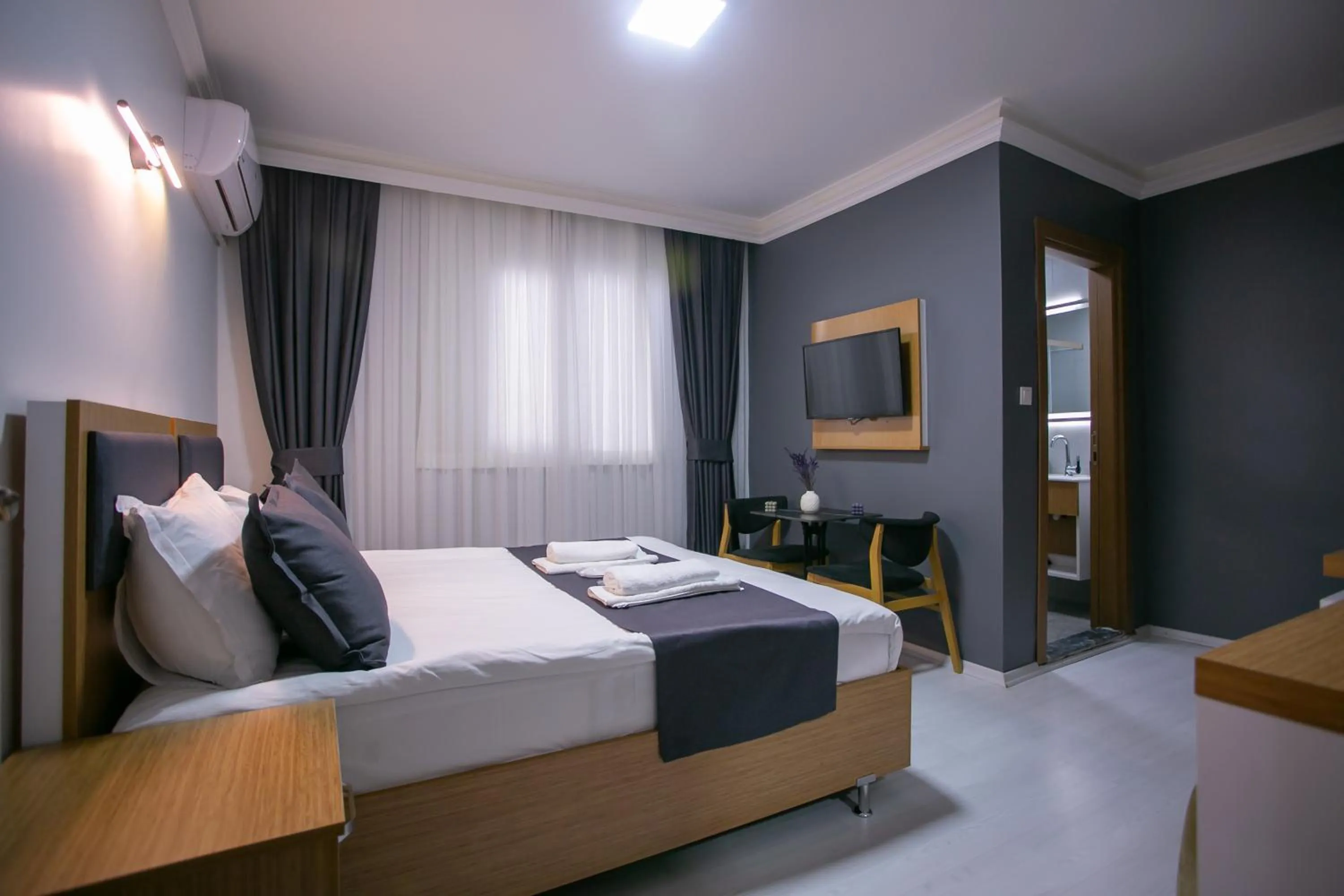 Photo of the whole room, Bed in BLAU GRÜN İSTANBUL OTEL