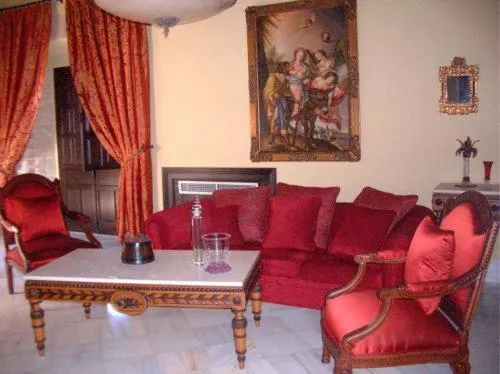 Communal lounge/ TV room in Hacienda Los Jinetes