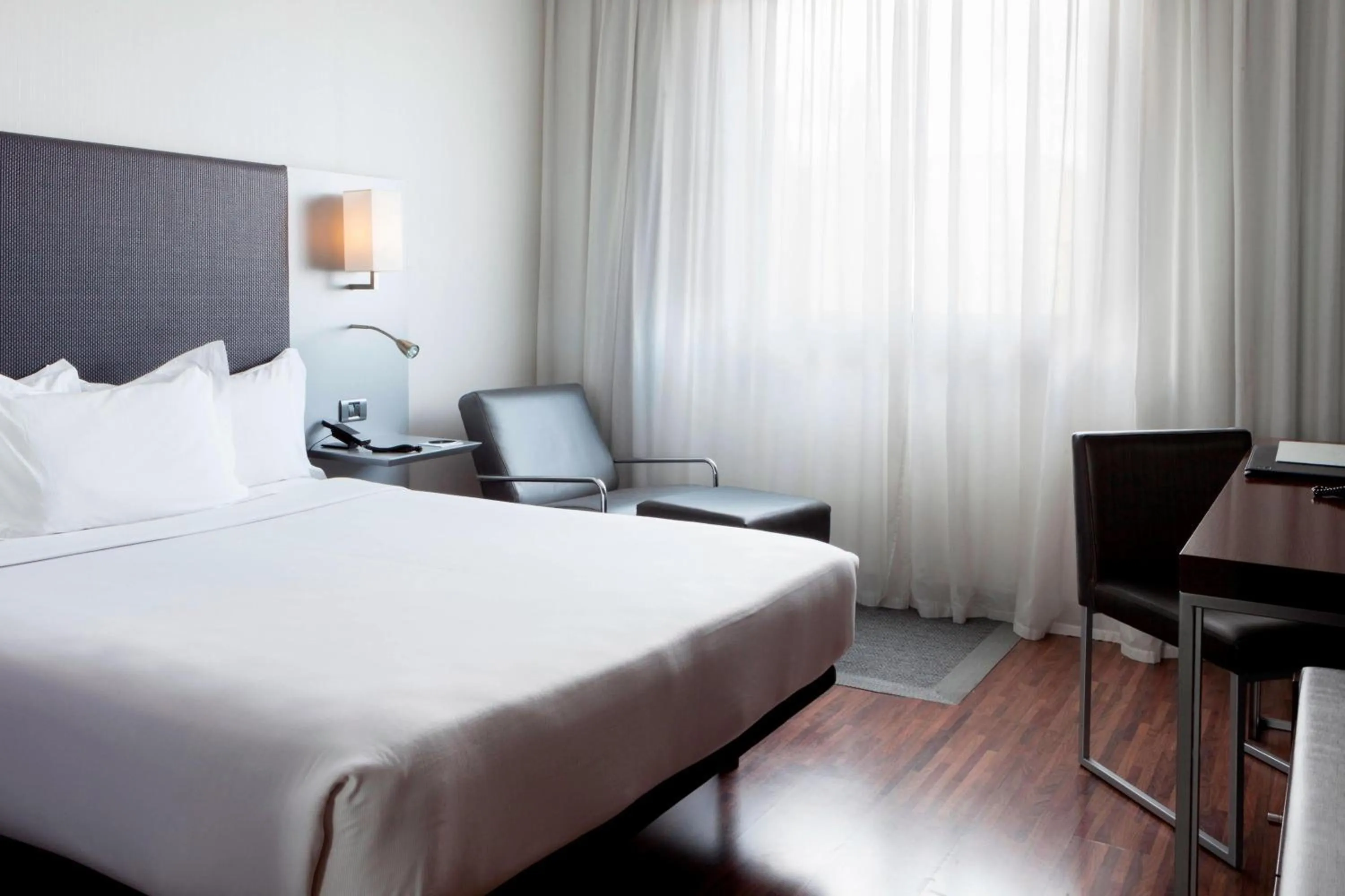 Photo of the whole room, Bed in AC Hotel by Marriott Madrid Airport