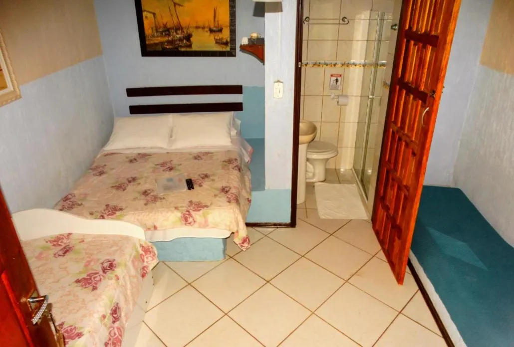 Bed in Pousada Refúgio Do Capitão