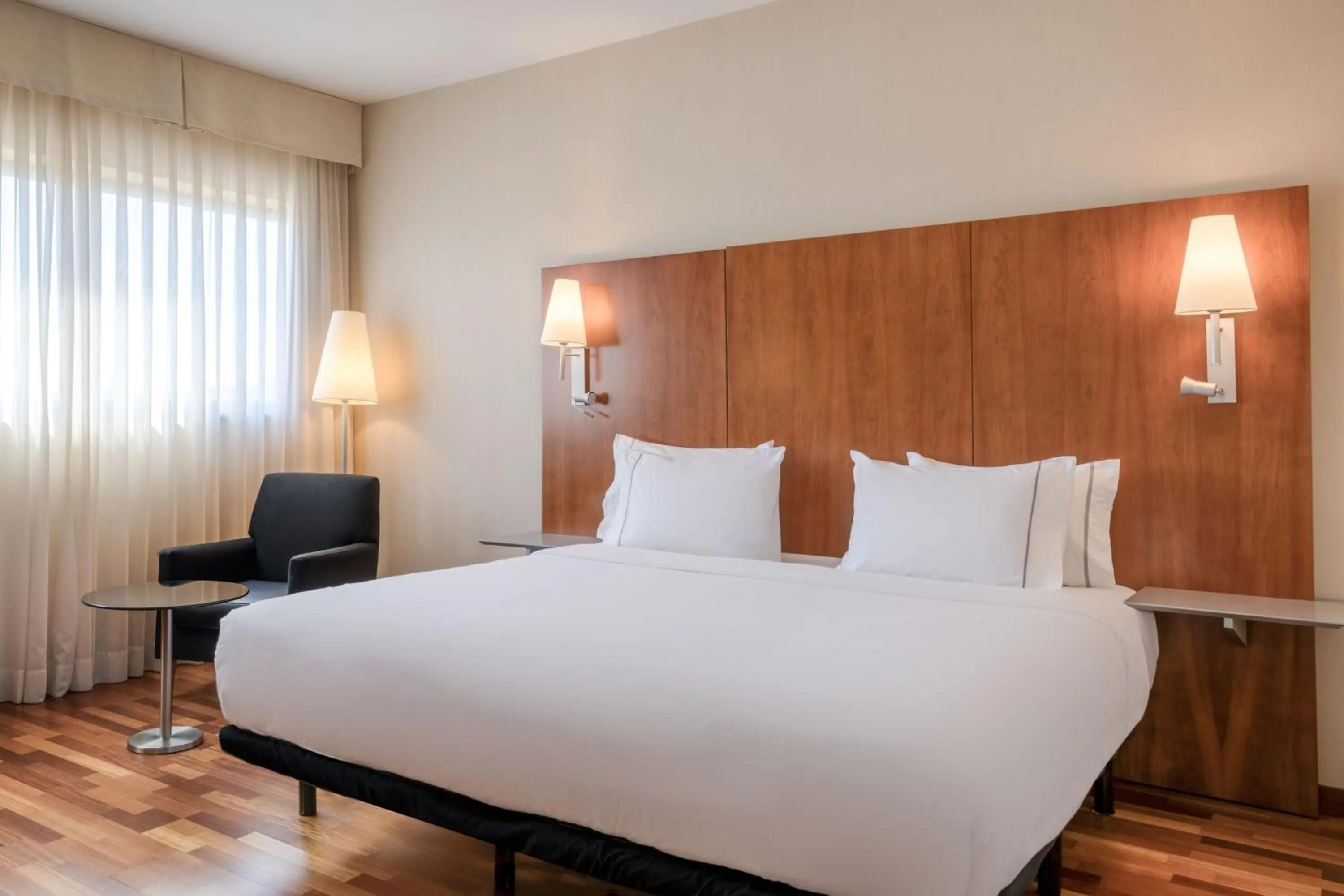 Photo of the whole room, Bed in AC Hotel Alcalá de Henares by Marriott