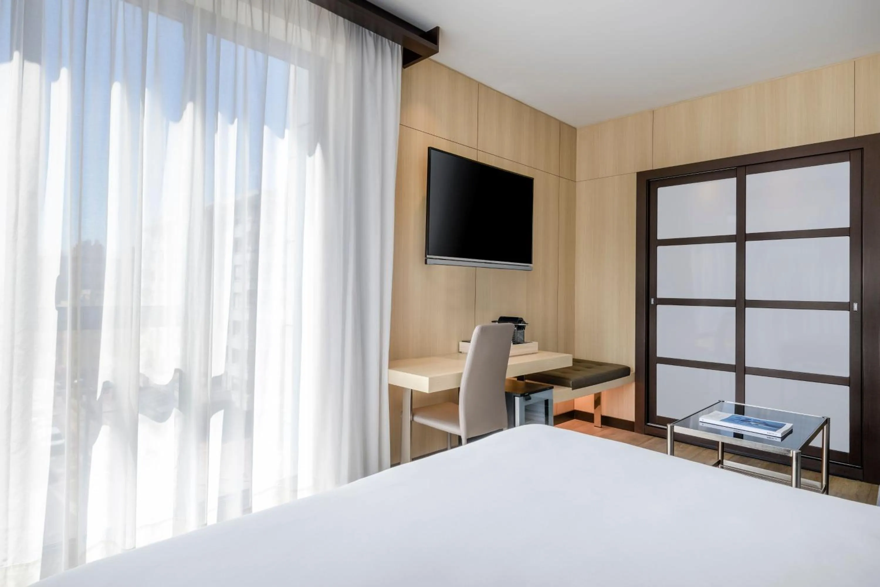 Photo of the whole room, Bed in AC Hotel Ciutat de Palma by Marriott