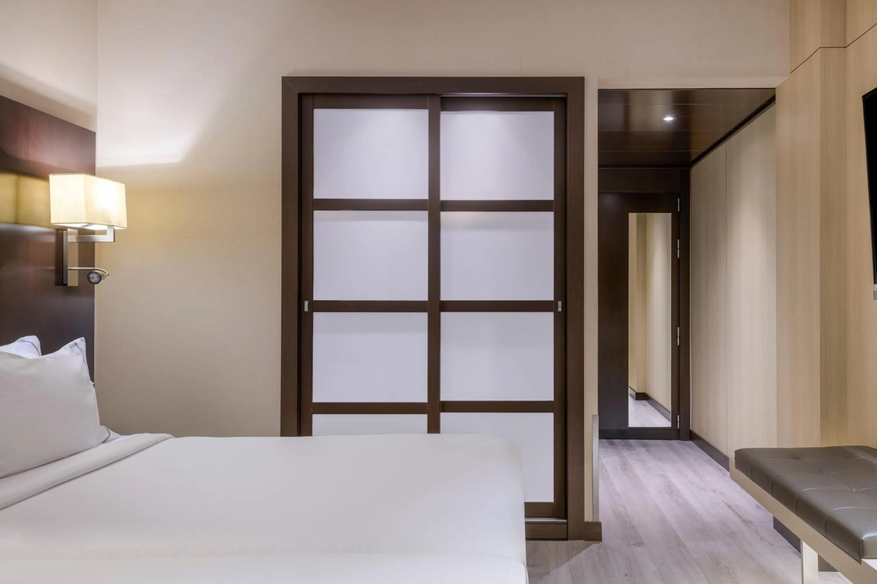 Photo of the whole room, Bed in AC Hotel Ciutat de Palma by Marriott