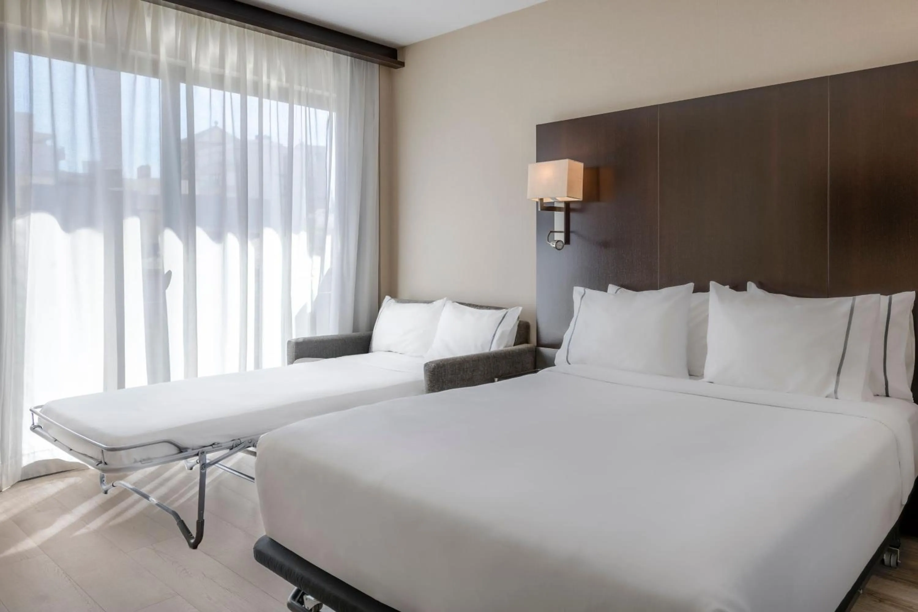 Photo of the whole room, Bed in AC Hotel Ciutat de Palma by Marriott