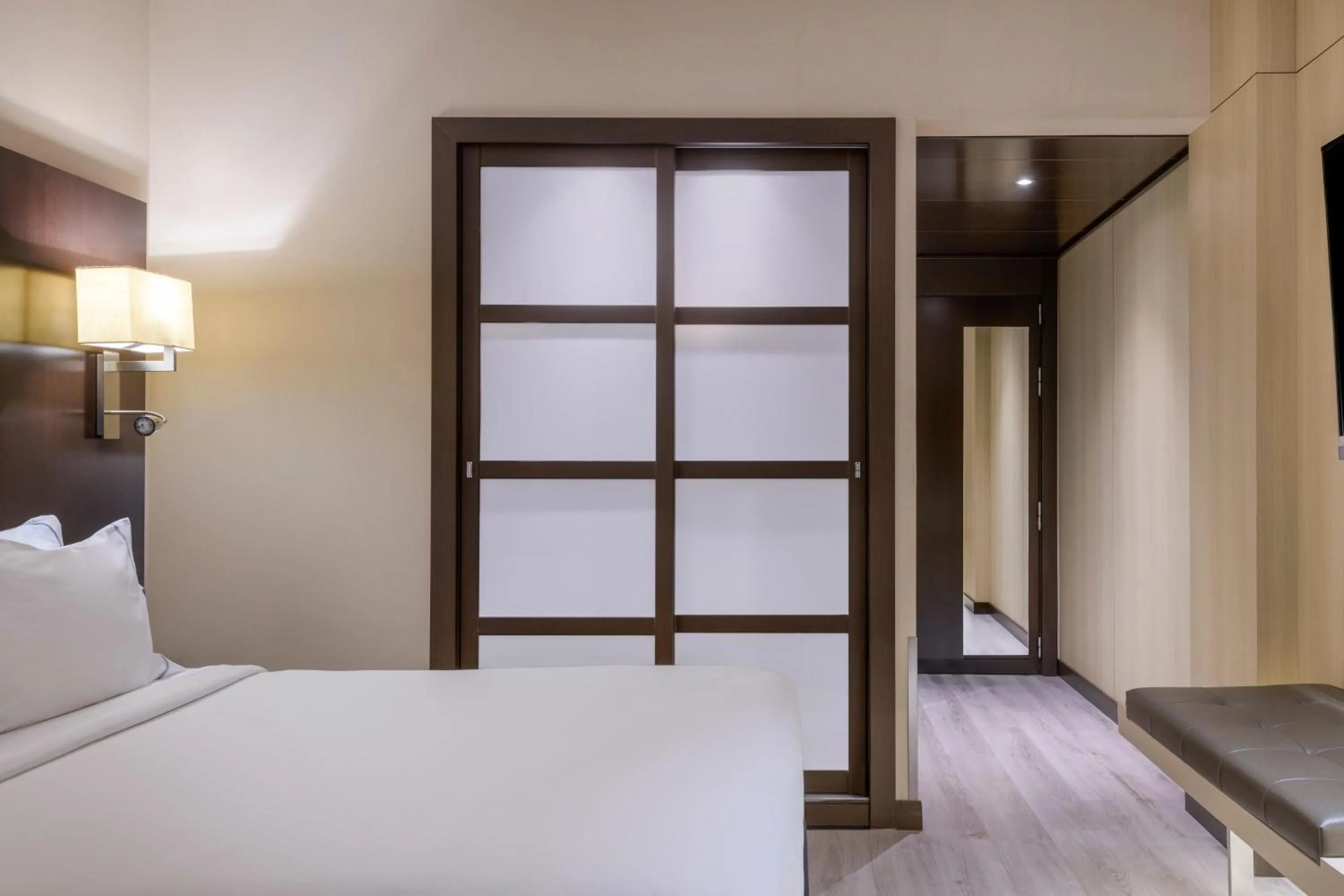 Photo of the whole room, Bed in AC Hotel Ciutat de Palma by Marriott