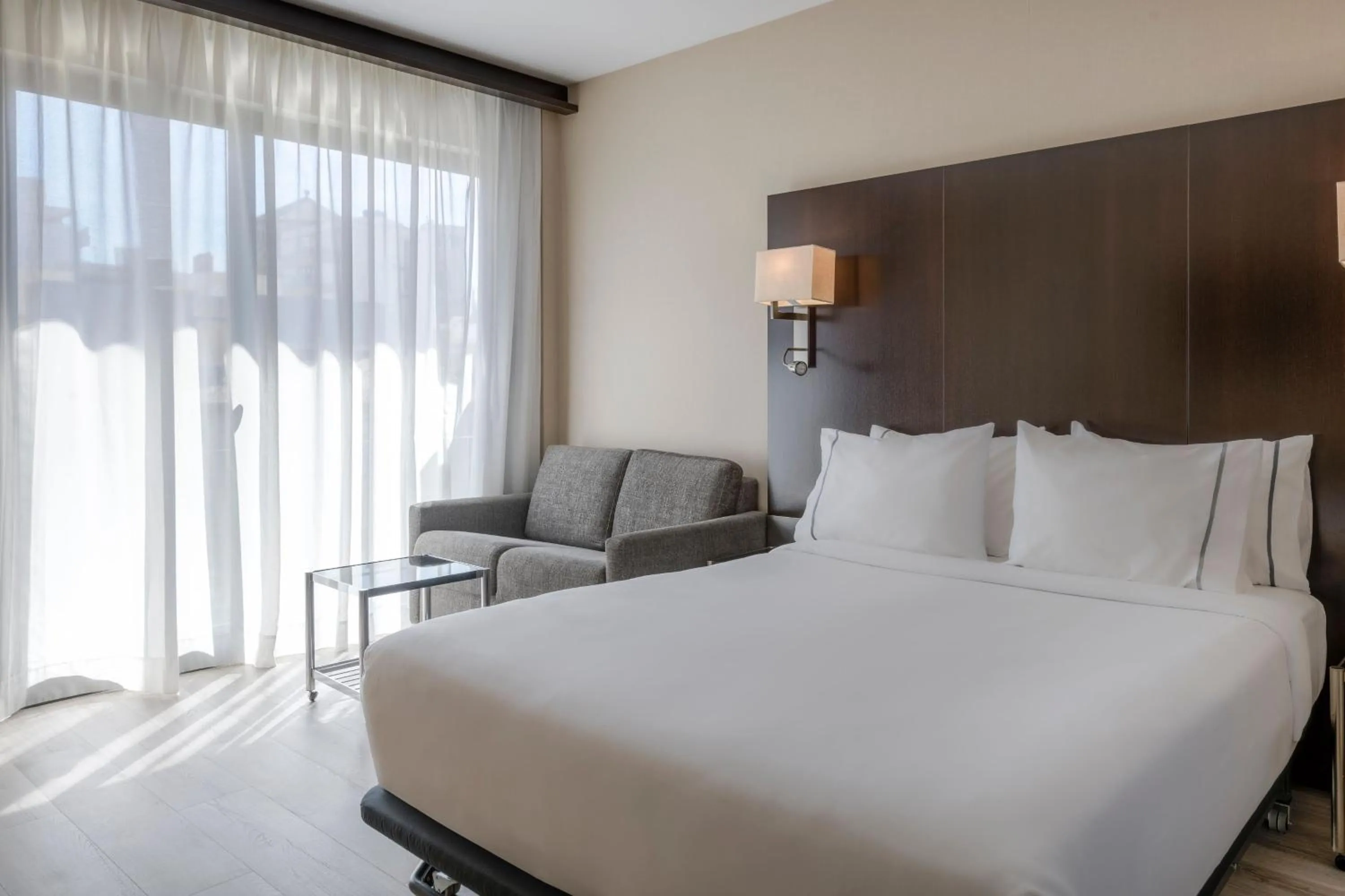 Photo of the whole room, Bed in AC Hotel Ciutat de Palma by Marriott