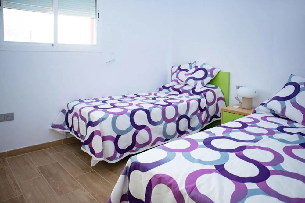 Bedroom, Bed in Apartamento "Casa el Sargazo" en Vera Playa con Piscina, Solarium, Wifi y Parking Gratis