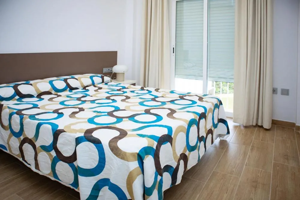 Bedroom, Bed in Apartamento "Casa el Sargazo" en Vera Playa con Piscina, Solarium, Wifi y Parking Gratis