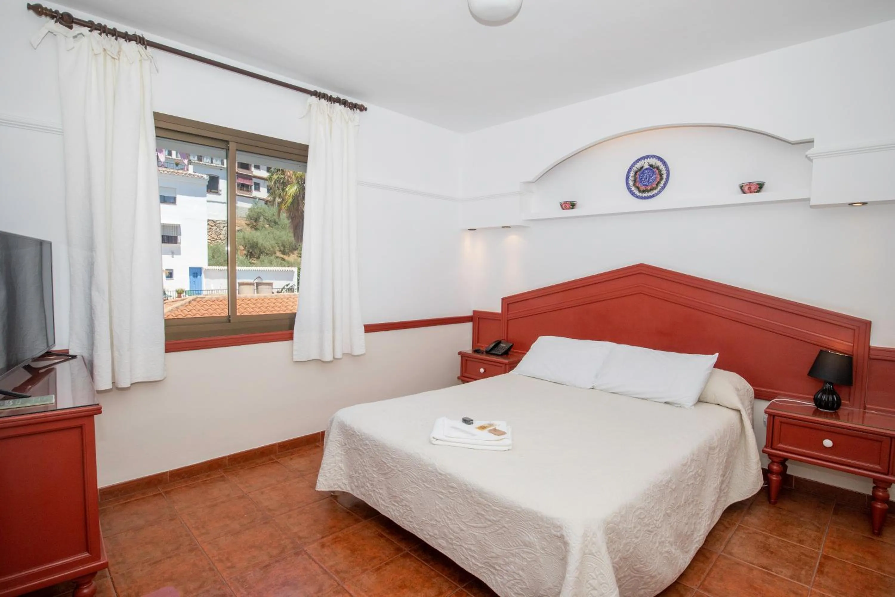 Photo of the whole room in Hotel y Bungalows Balcón de Competa
