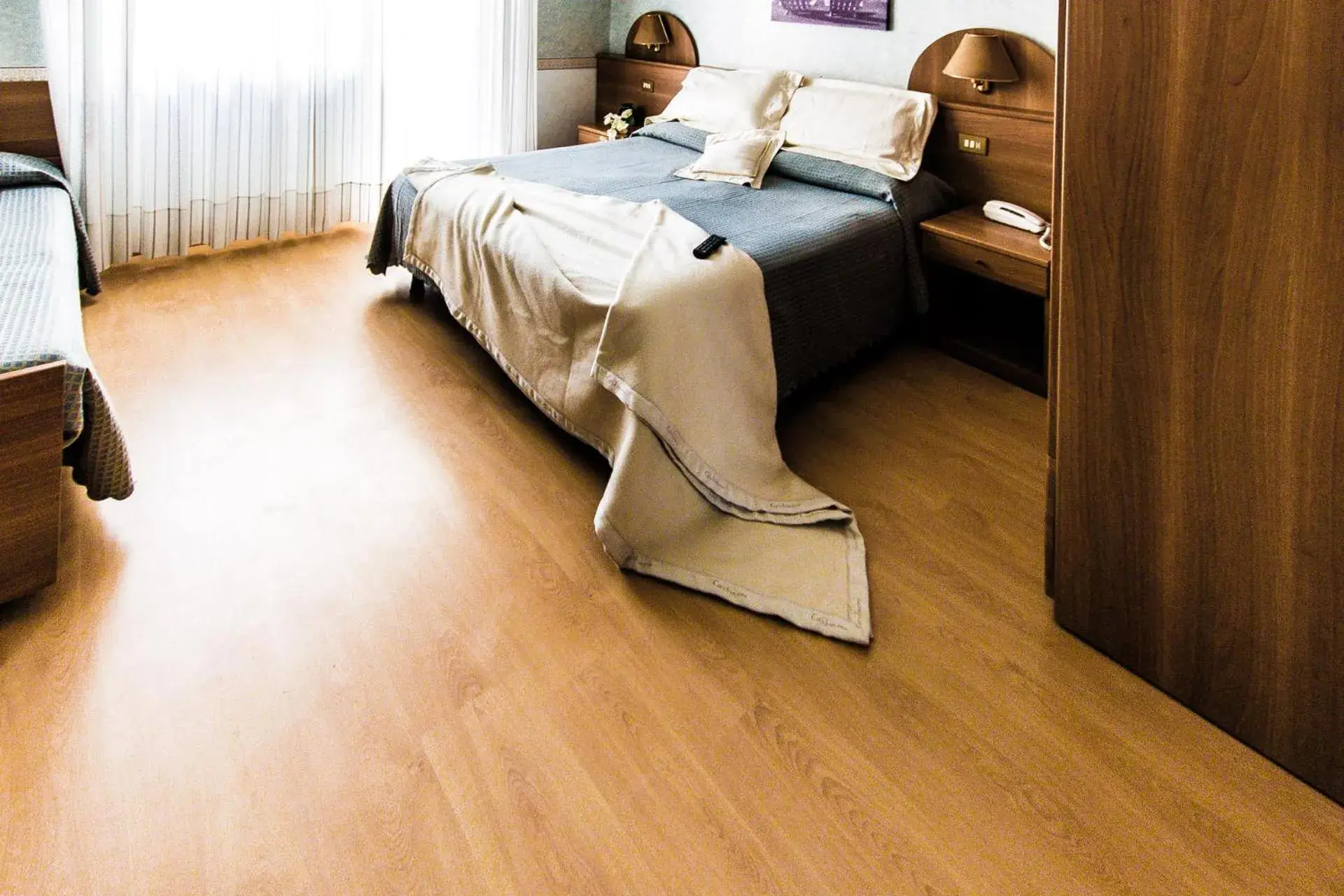 Quadruple Room in Hotel Baviera Quadruple Room in Hotel Baviera