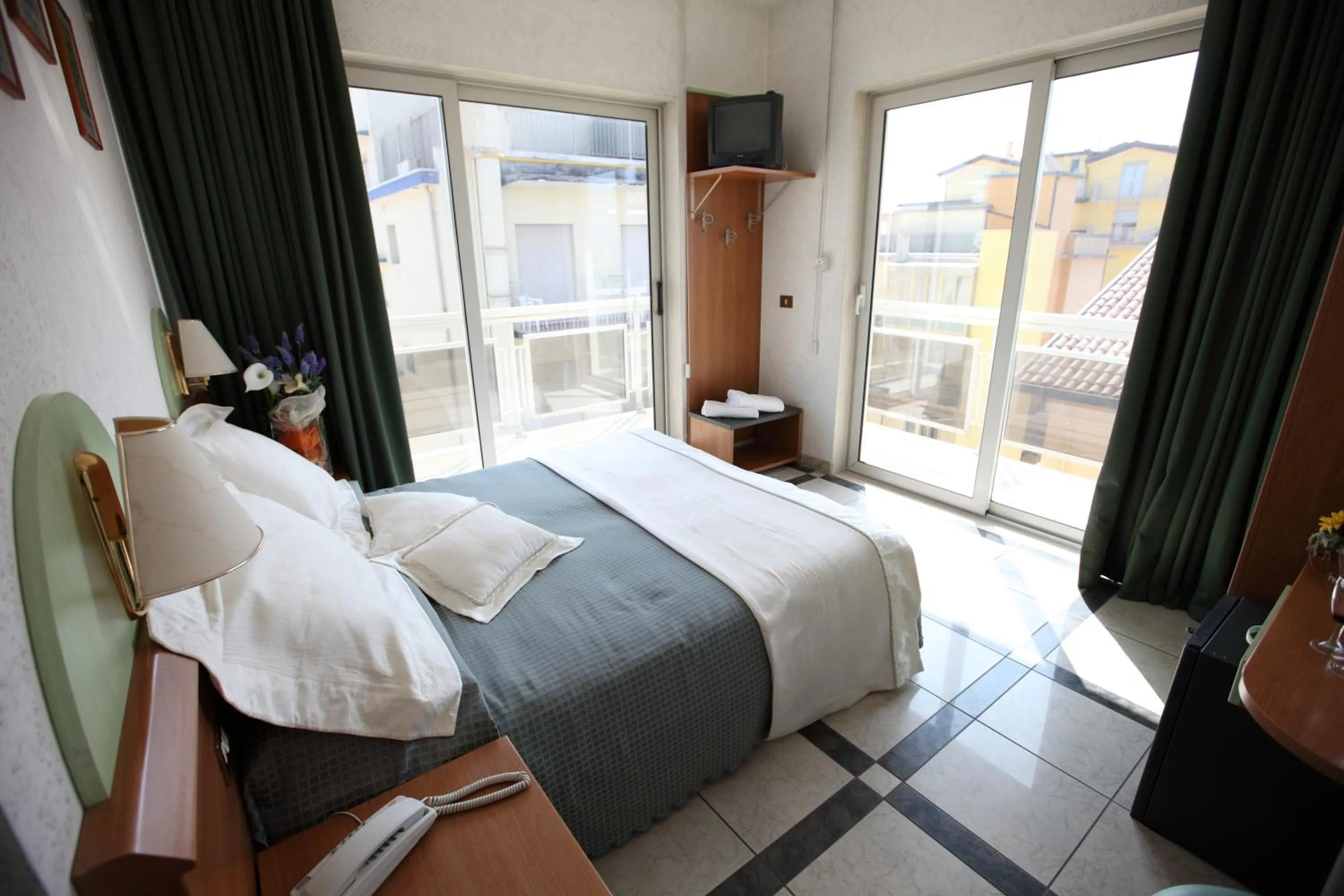 Bedroom in Hotel Baviera