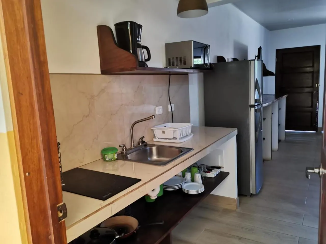 Kitchen or kitchenette in Cabinas El Colibri, Apart Hotel