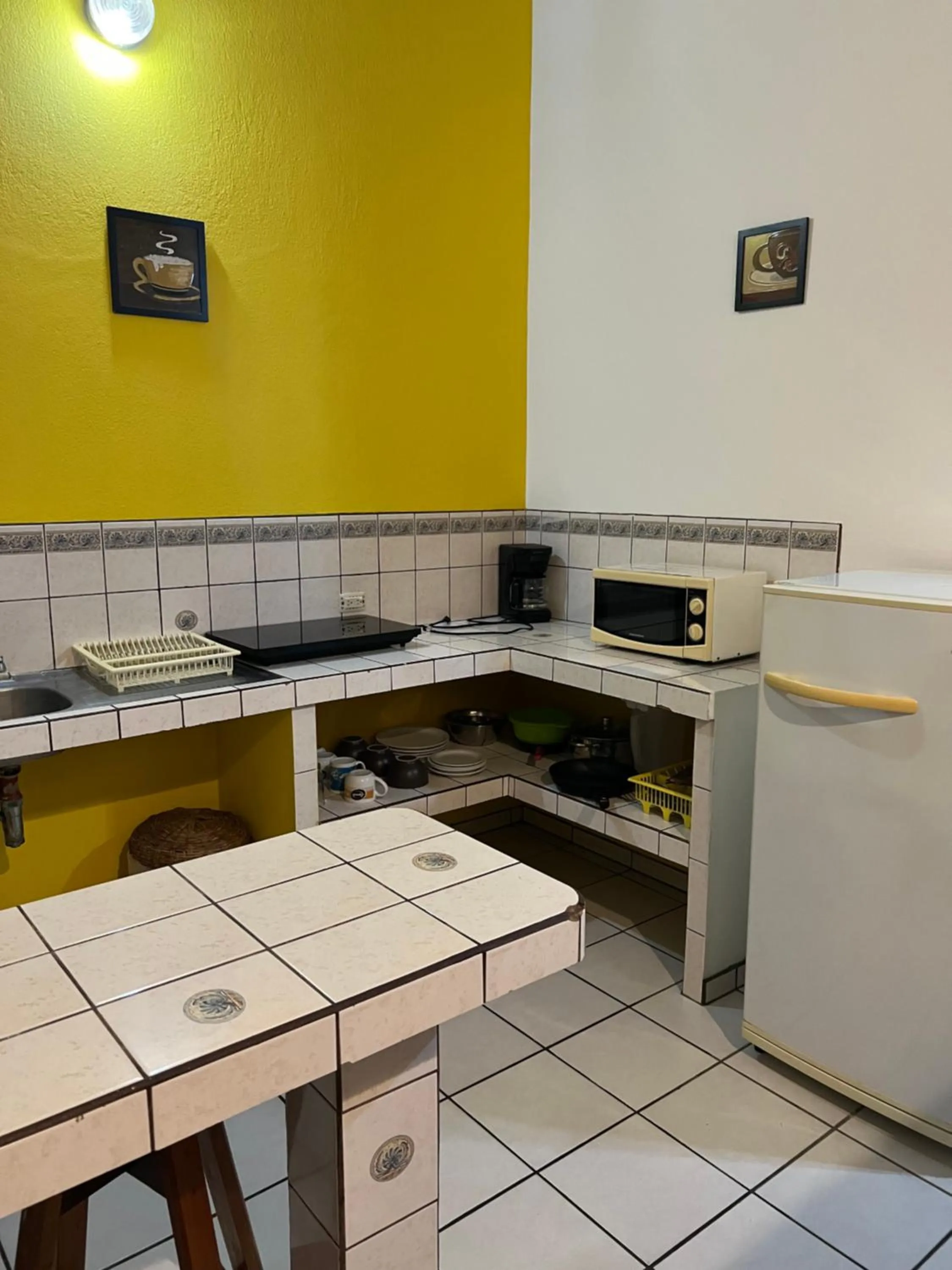 Kitchen or kitchenette in Cabinas El Colibri, Apart Hotel