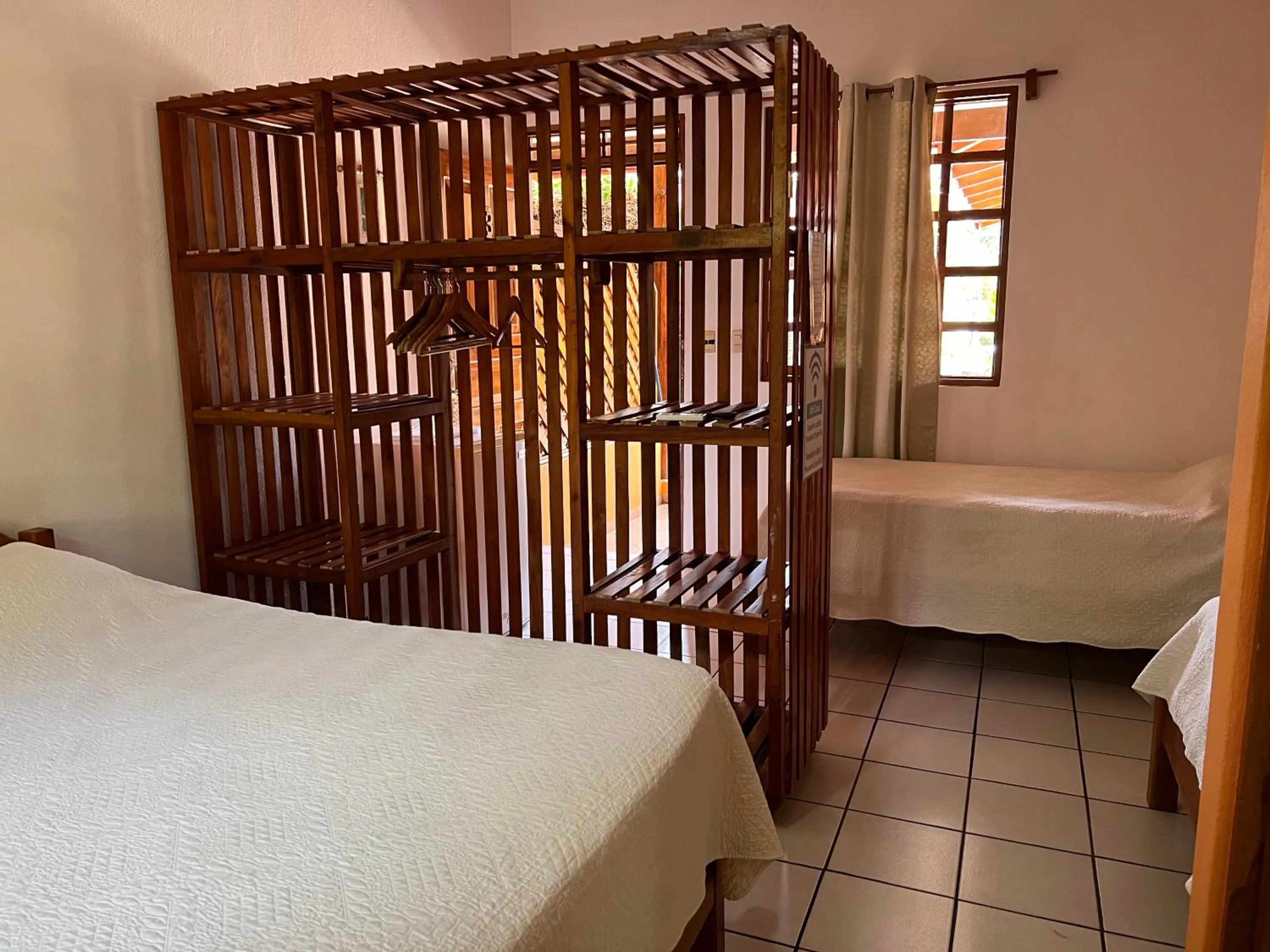 Photo of the whole room, Bed in Cabinas El Colibri, Apart Hotel