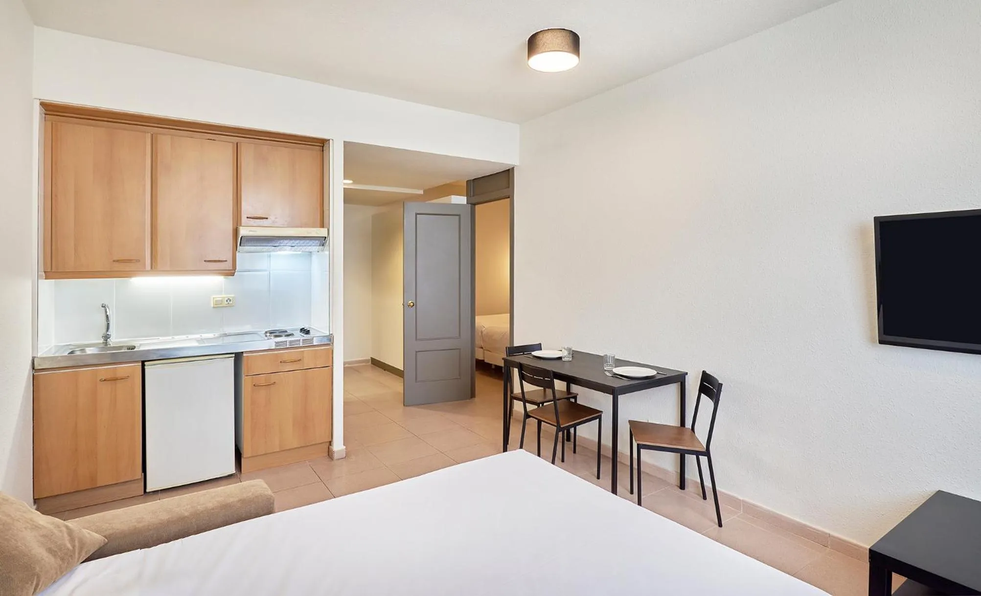 kitchen, Bed in Hesperia Sant Joan