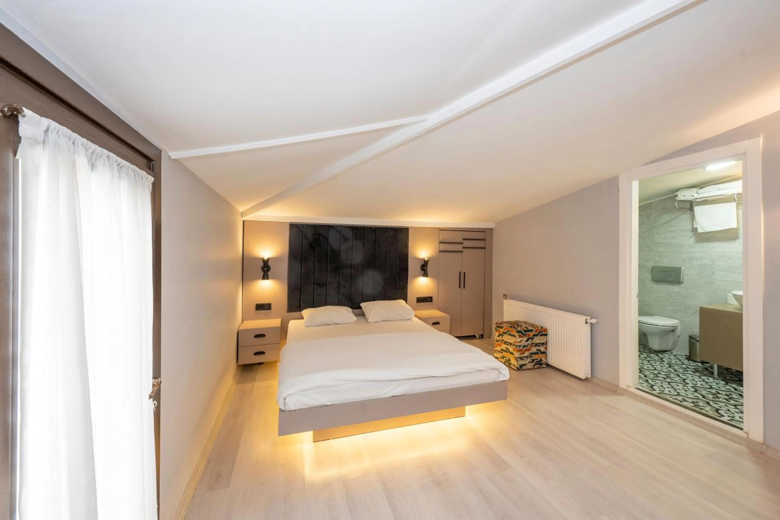 Bed in Cirrus Suites