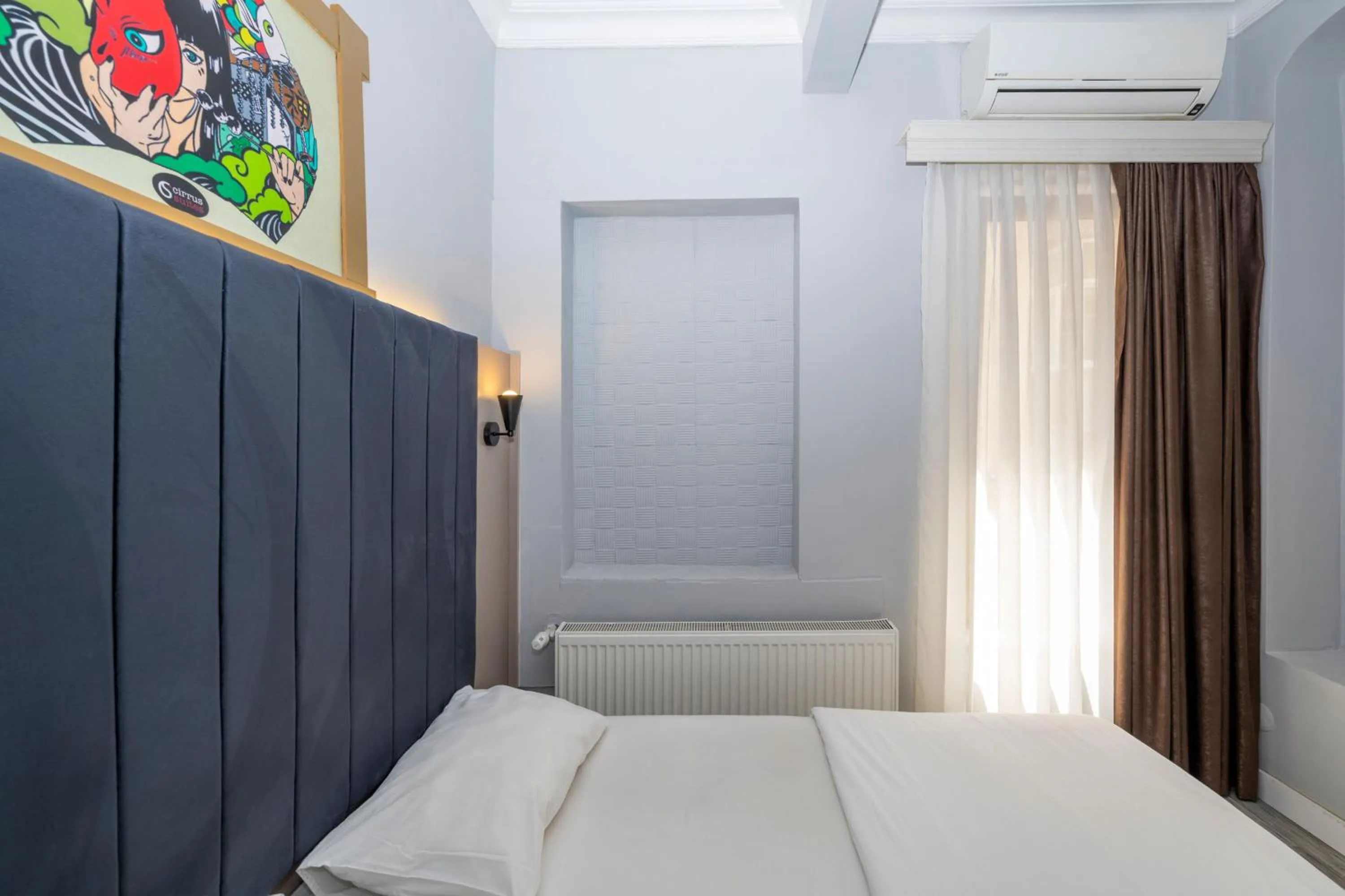 Bed in Cirrus Suites