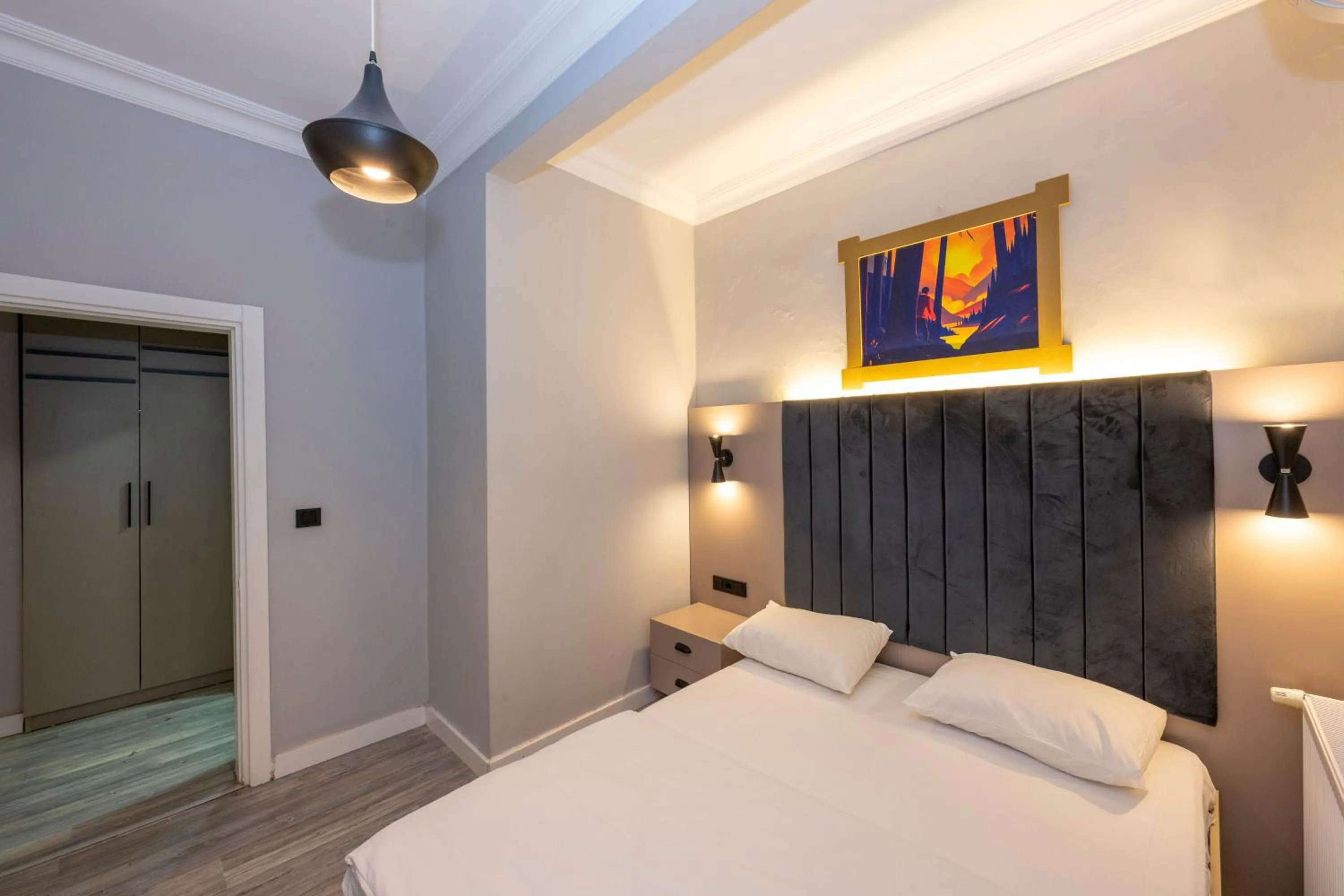 Bed in Cirrus Suites