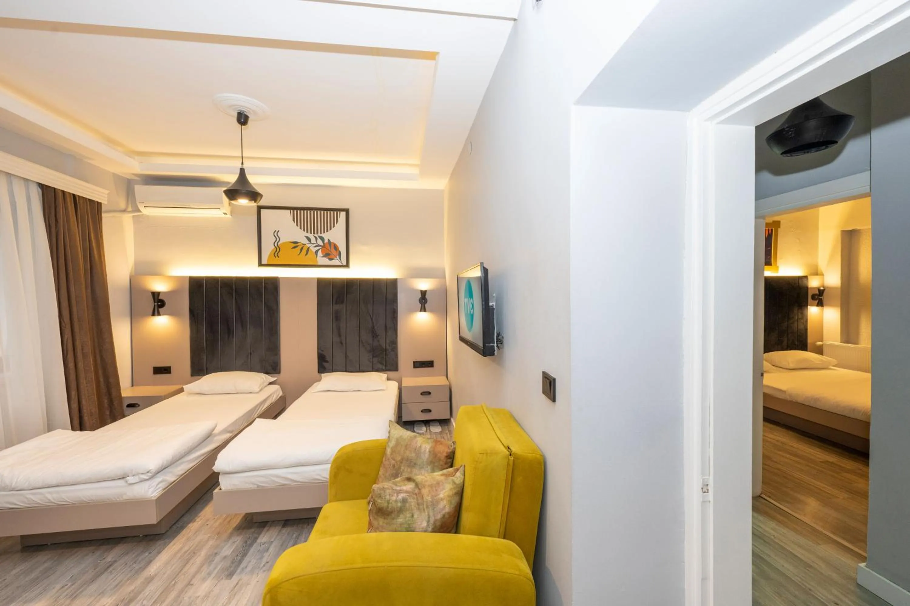 Bed in Cirrus Suites