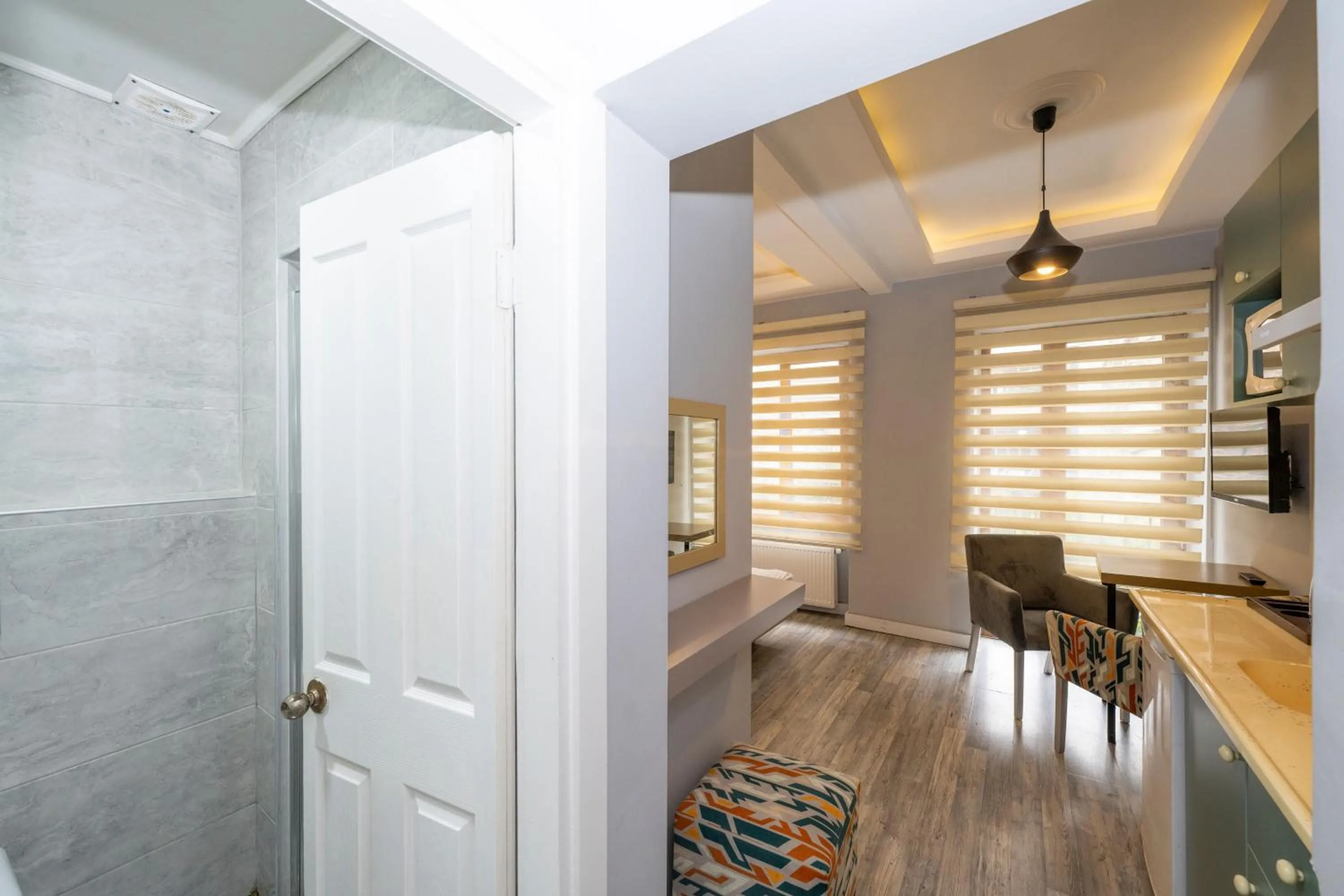 Kitchen or kitchenette in Cirrus Suites