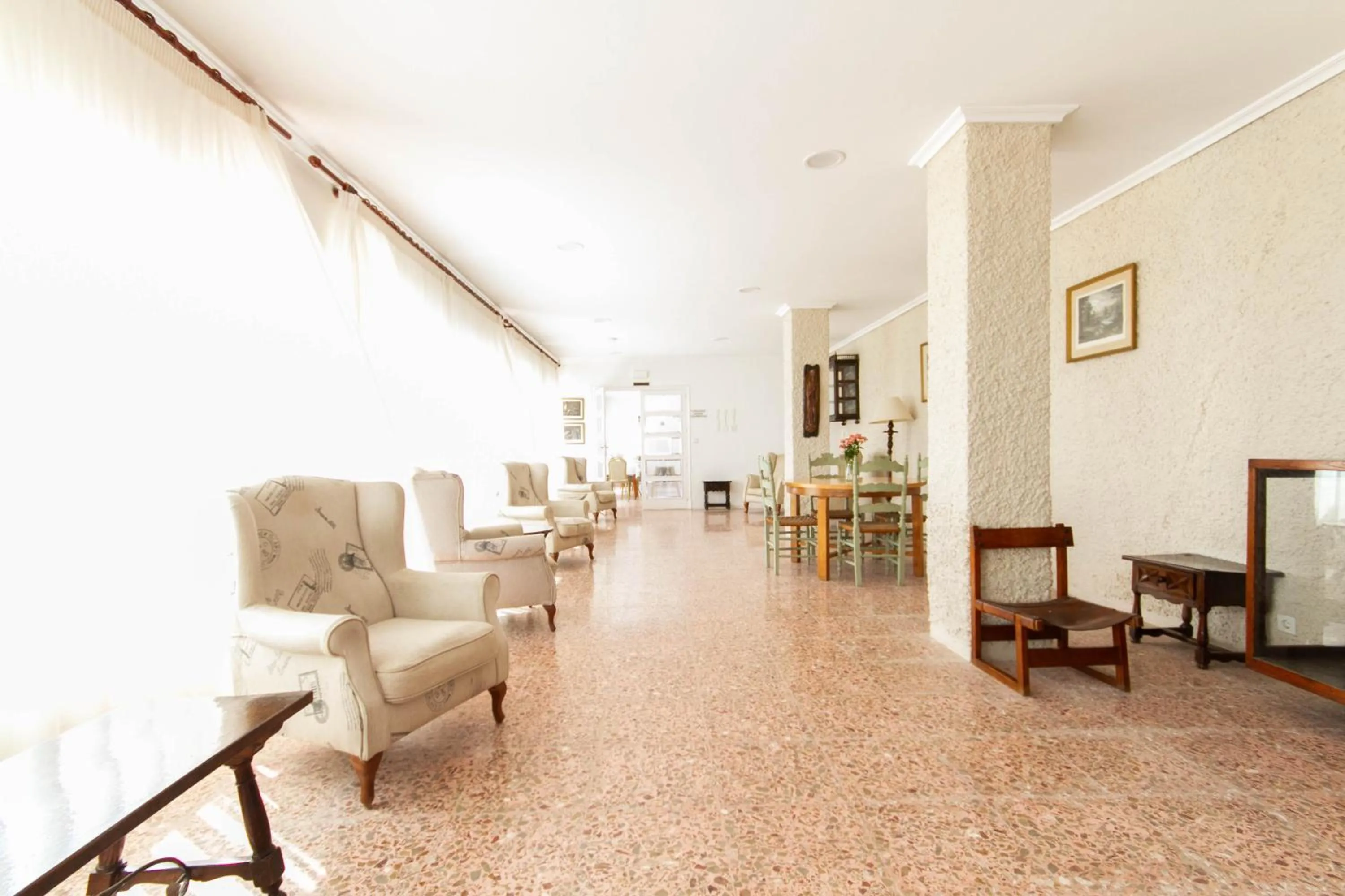 Communal lounge/ TV room in Hostal San Juan