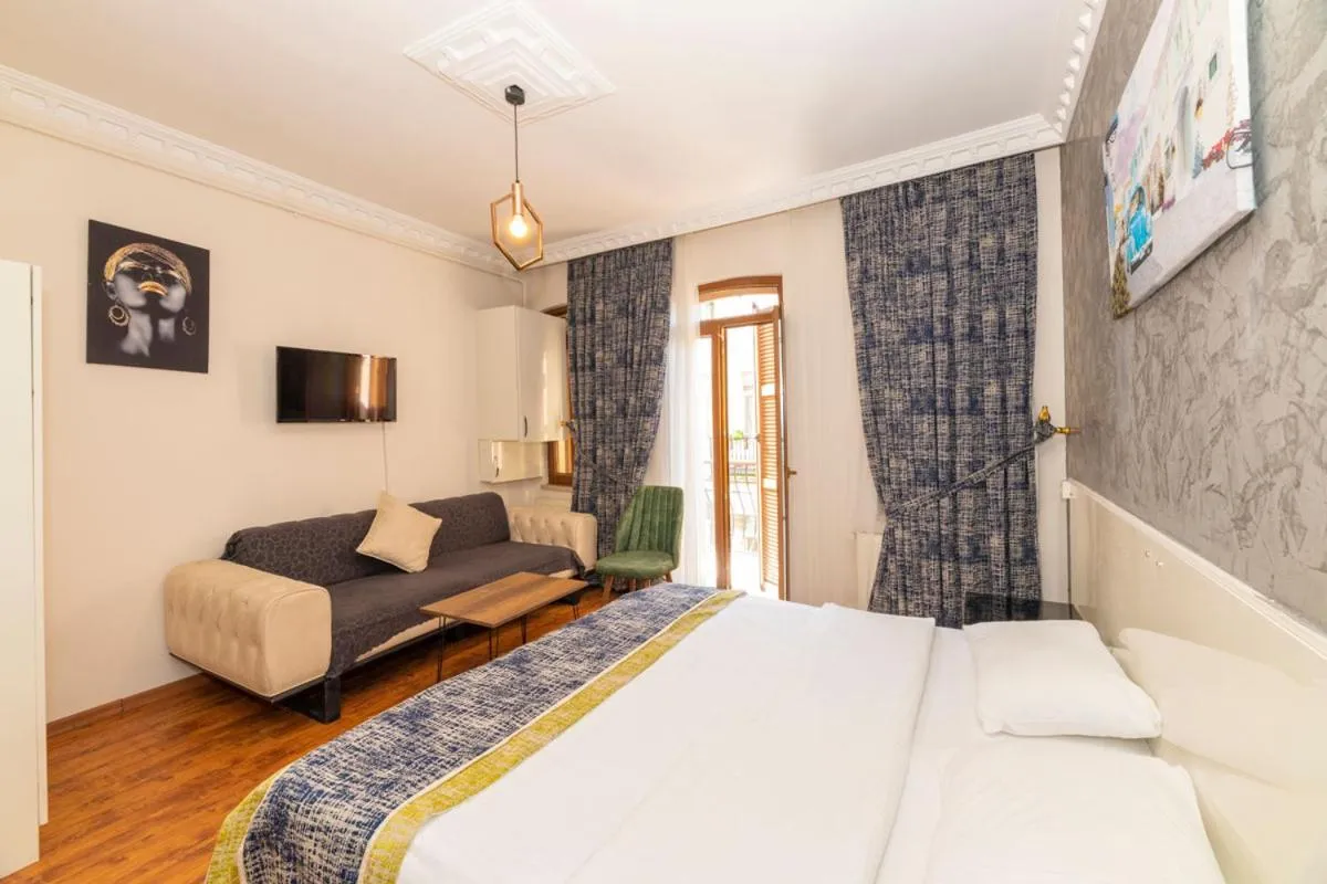 Bed in GRAND OPERA HOTEL