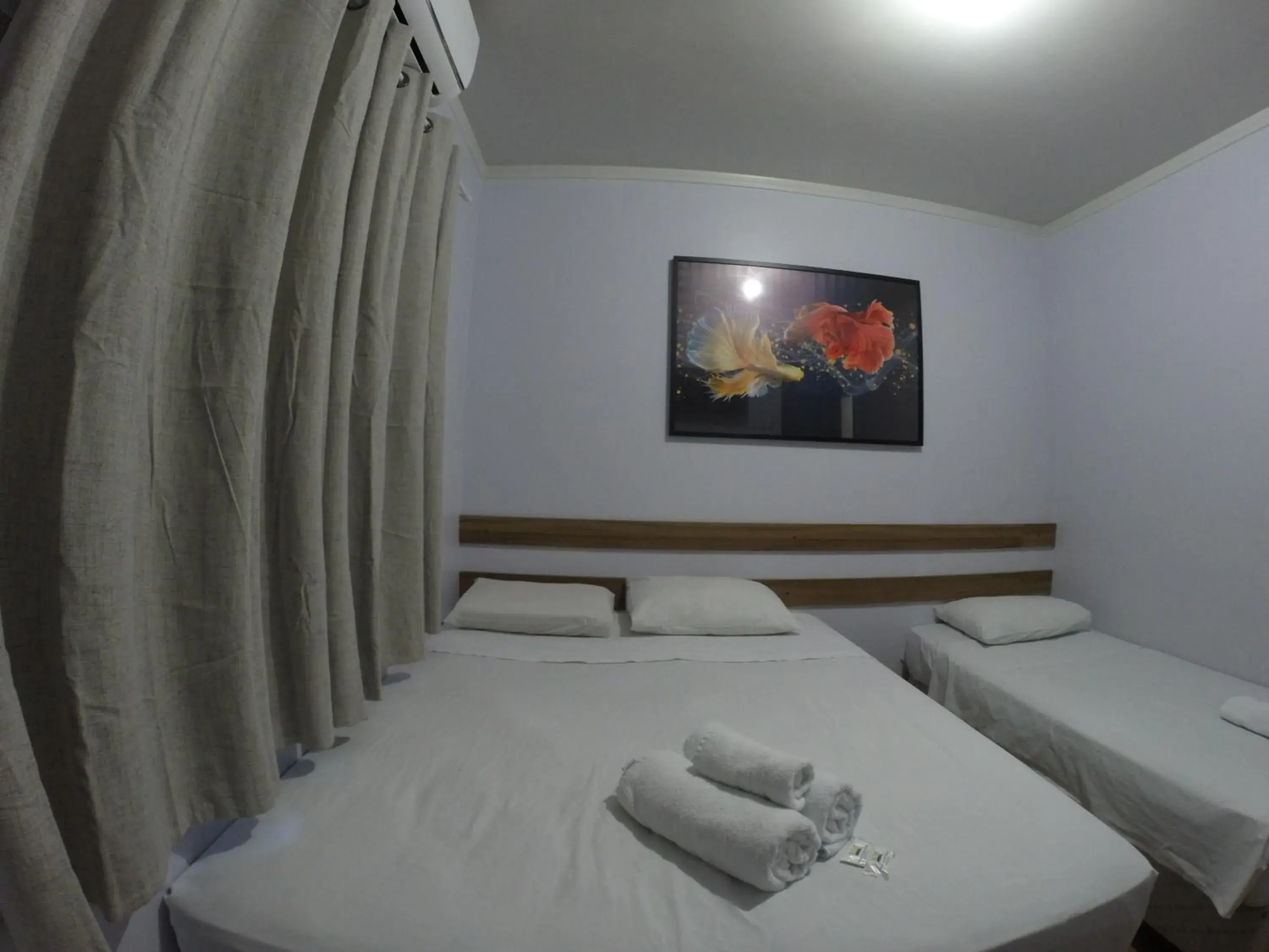 Deluxe Triple Room in POUSADA EVELINA Deluxe Triple Room in POUSADA EVELINA