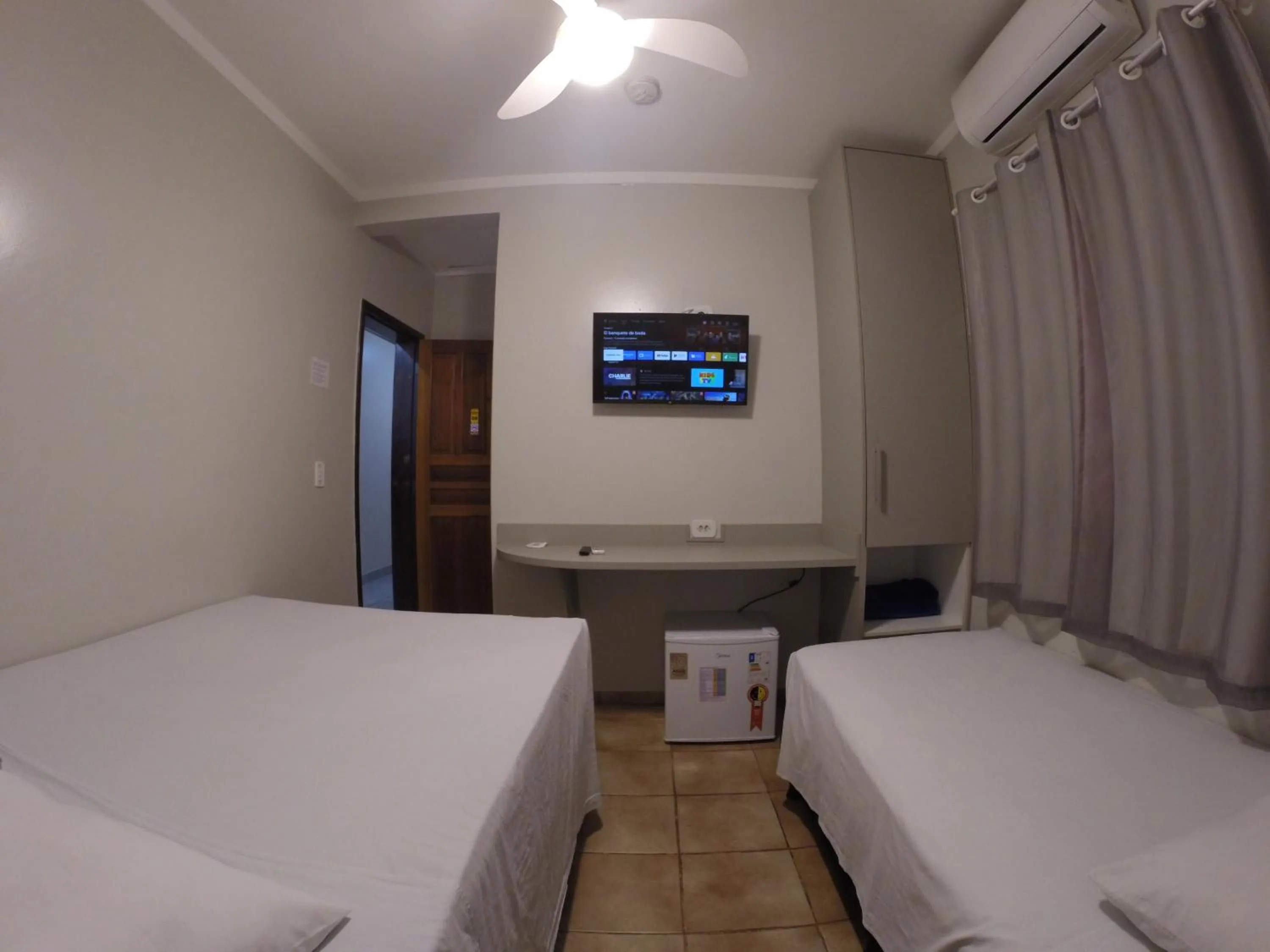 Bed in POUSADA EVELINA