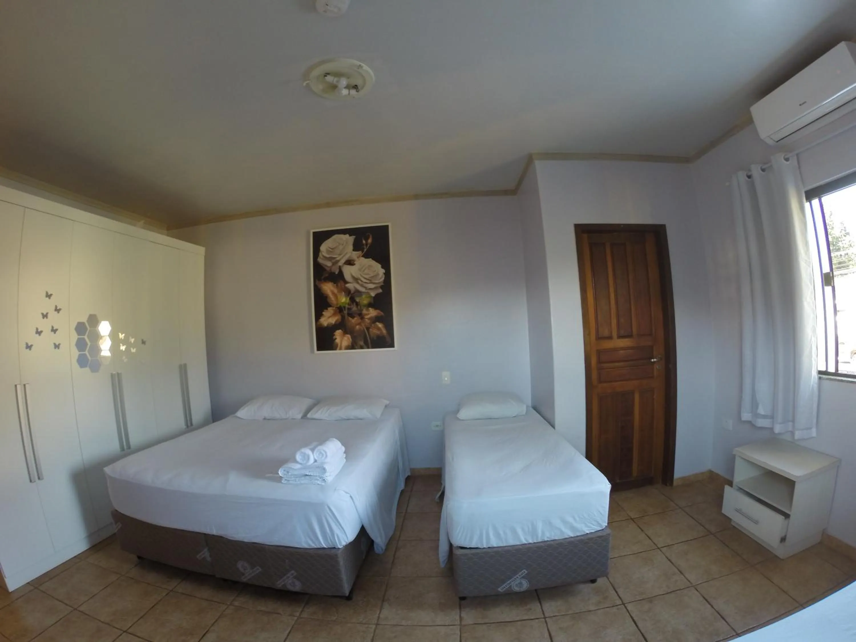 Bed in POUSADA EVELINA